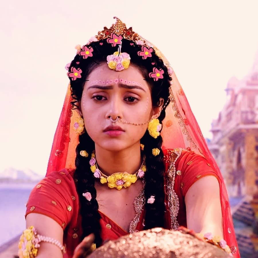Mallika Singh, vibrant red traditional Indian attire, pink and yellow flowers, SD Desktop Wallpaper