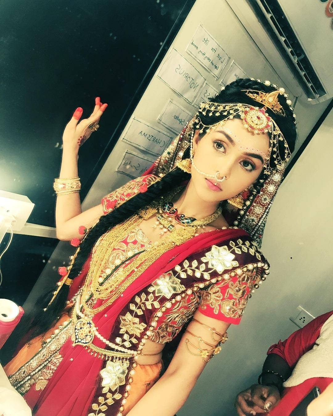 Mallika Singh, aircon room, ornate red and gold traditional Indian attire, HD Phone Wallpaper