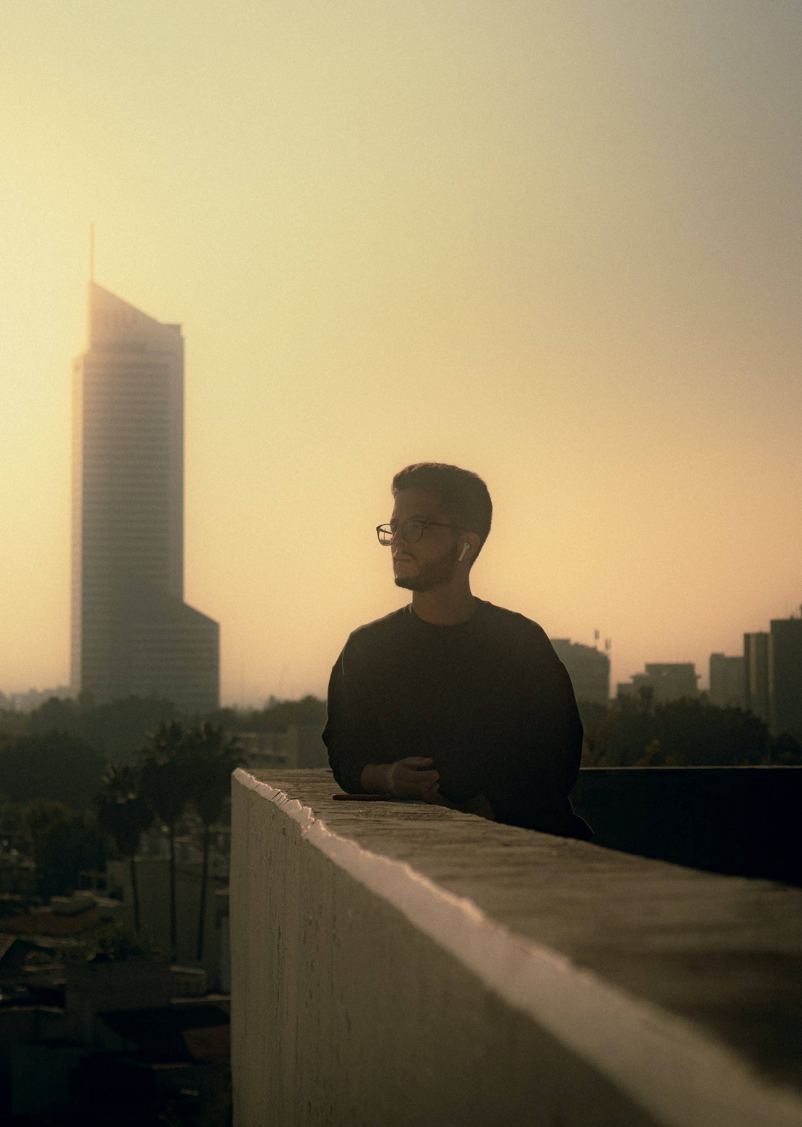 roof deck, man, glasses, 4K Phone Wallpaper