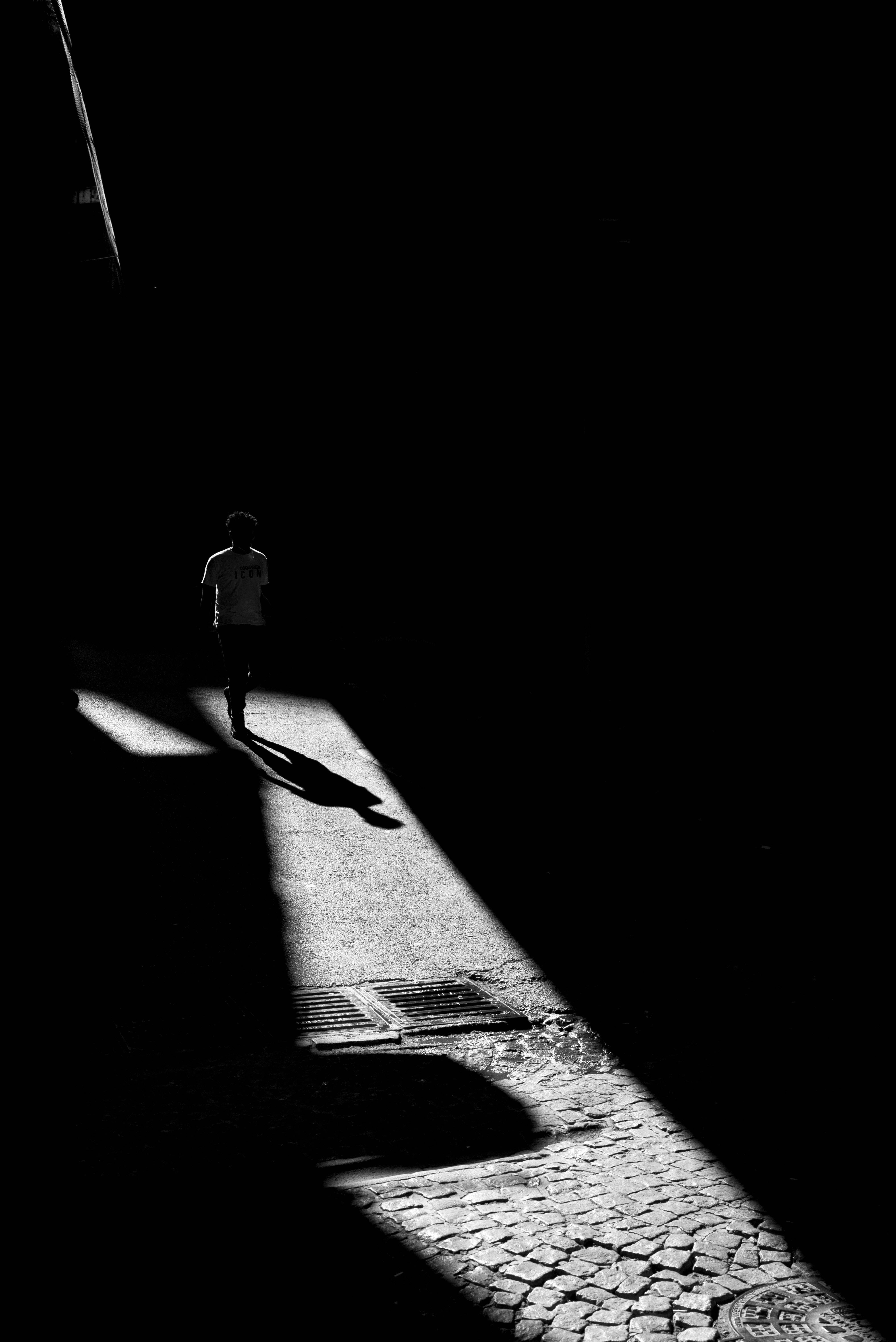 Shadowed Alley, lone figure, cobblestone alley, 5K Phone Wallpaper
