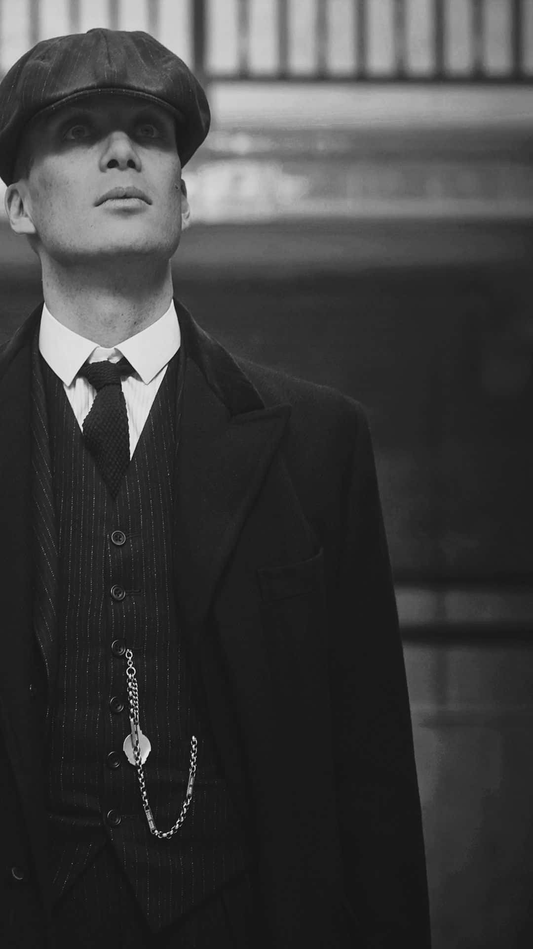 pinstripe suit, flat cap, monochrome urban setting, Full HD Phone Wallpaper