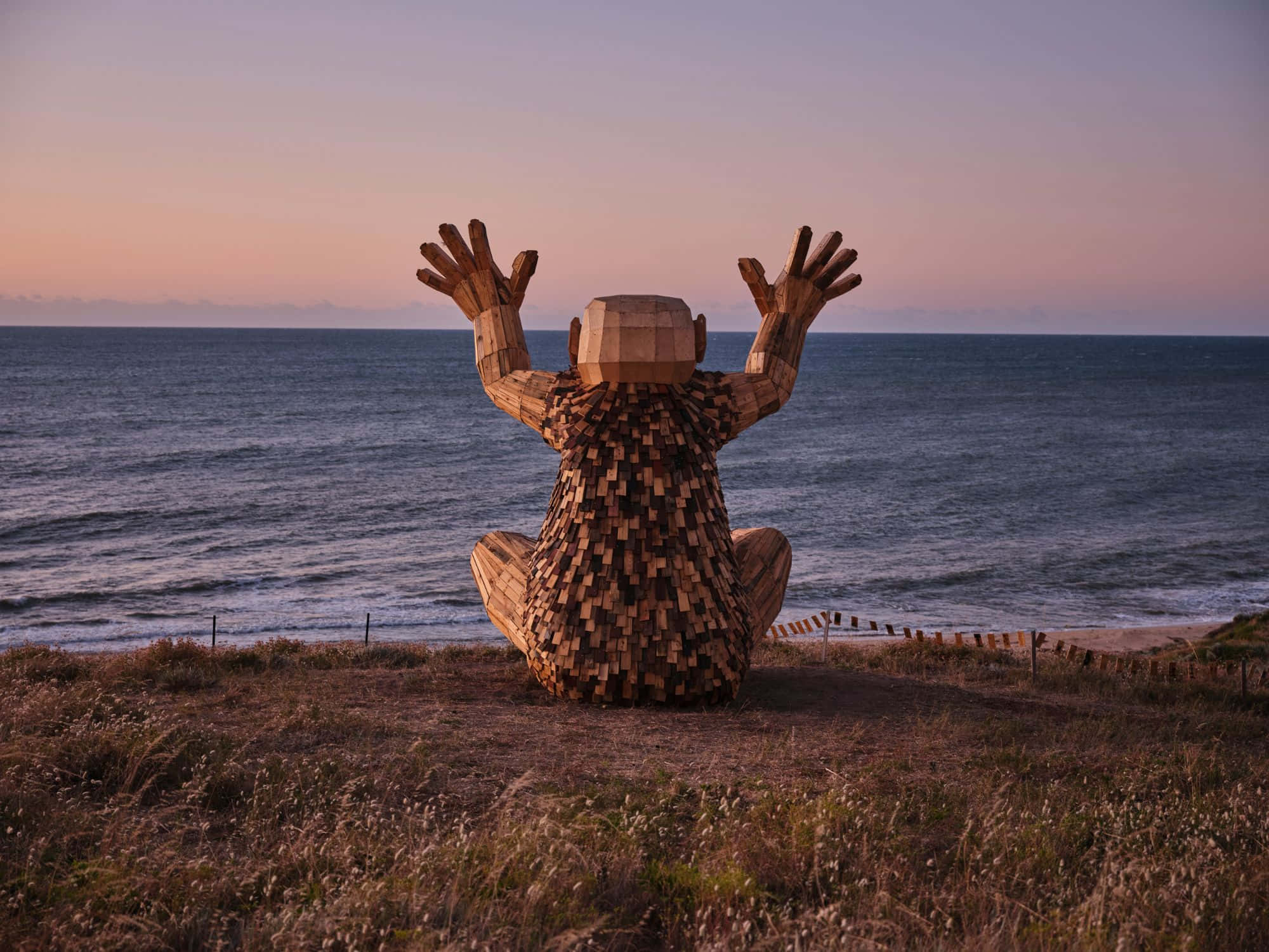 wooden sculpture, seated figure, raised hands, Full HD Desktop Wallpaper
