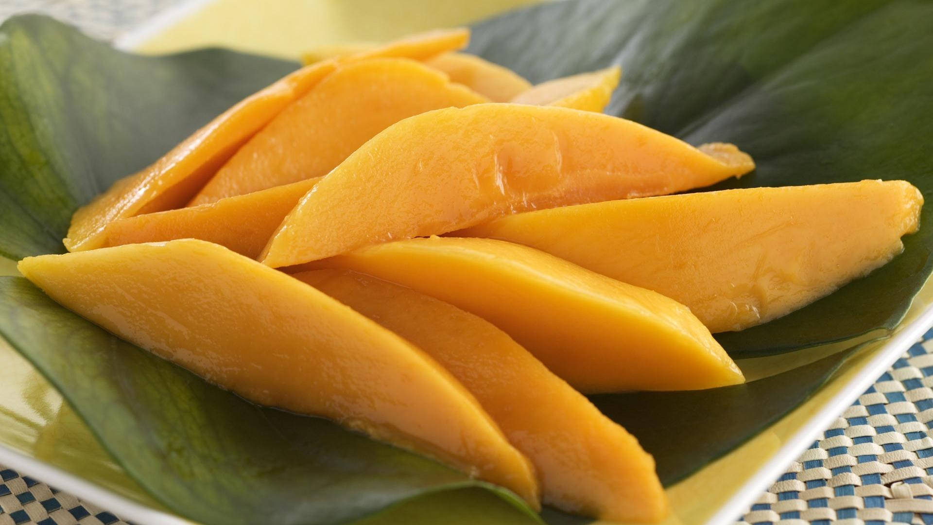 ripe mango, golden mango slices, large green leaf, Full HD Desktop Wallpaper