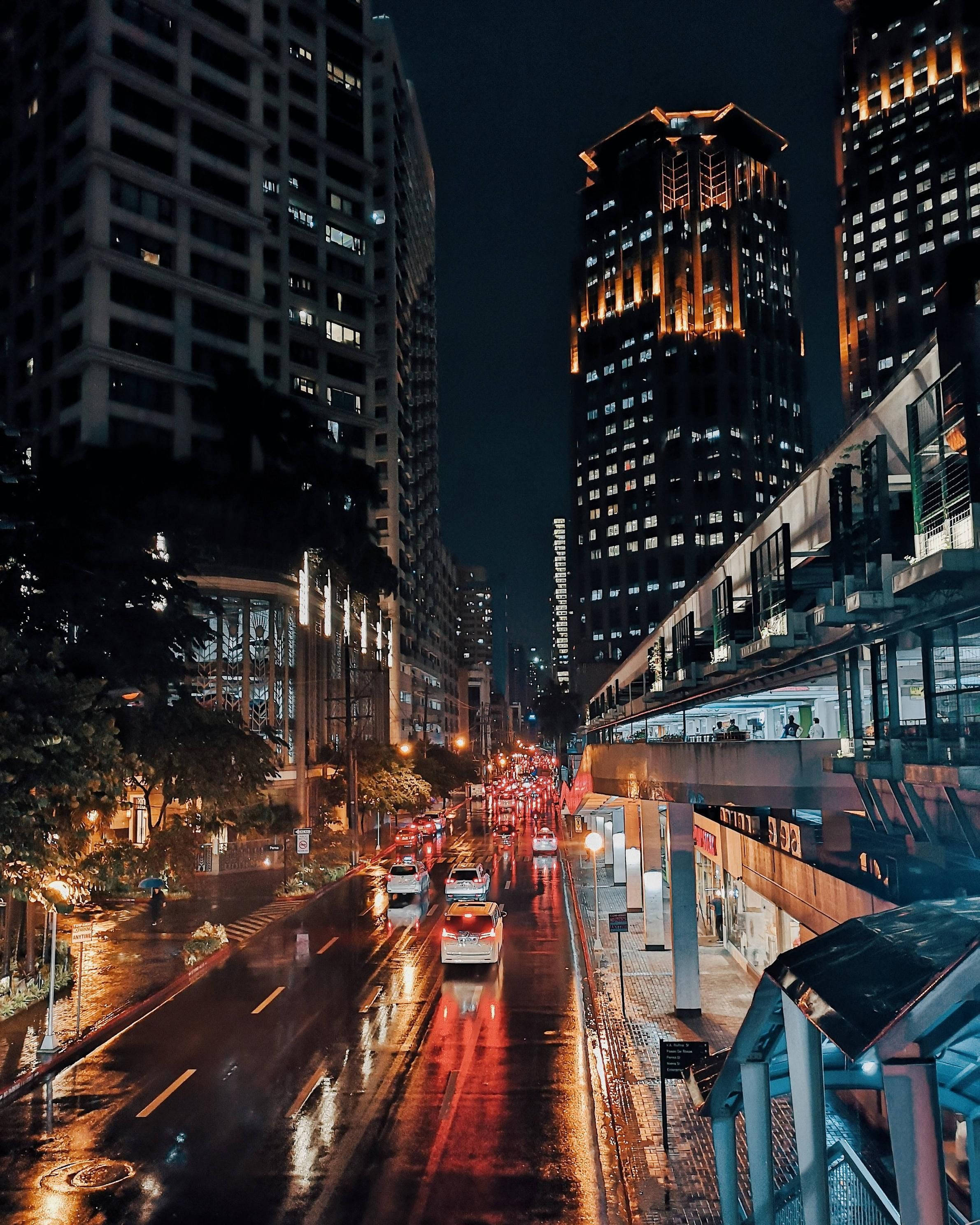 Manila, night, rain-slicked city street, 2K Phone Wallpaper