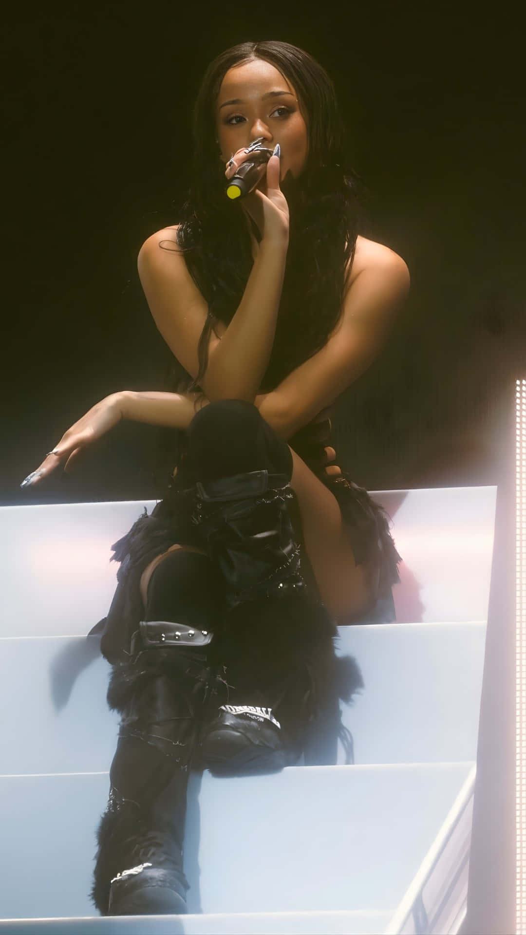 Manon Bannerman, all black leather and feathered attire, glowing white steps, Full HD Phone Wallpaper