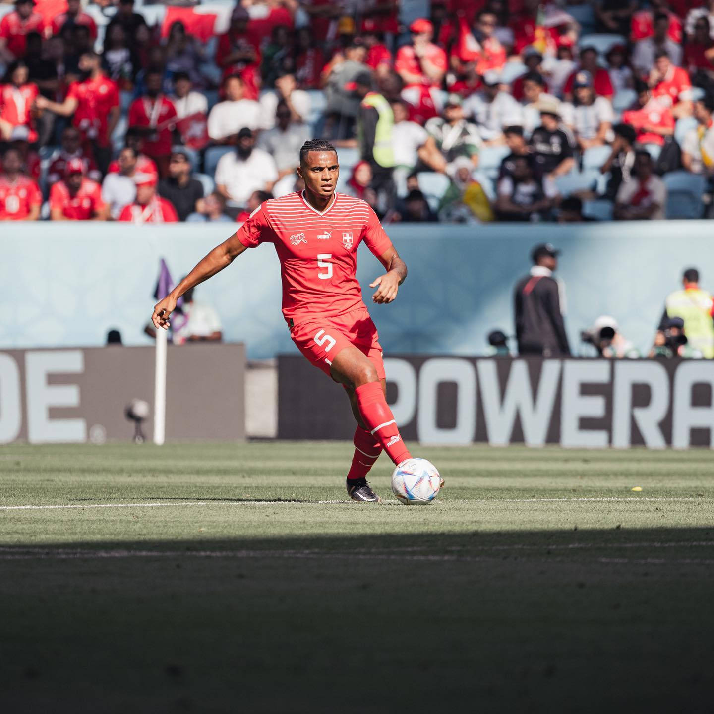Manuel Akanji, red jersey, number five, HD Desktop Wallpaper