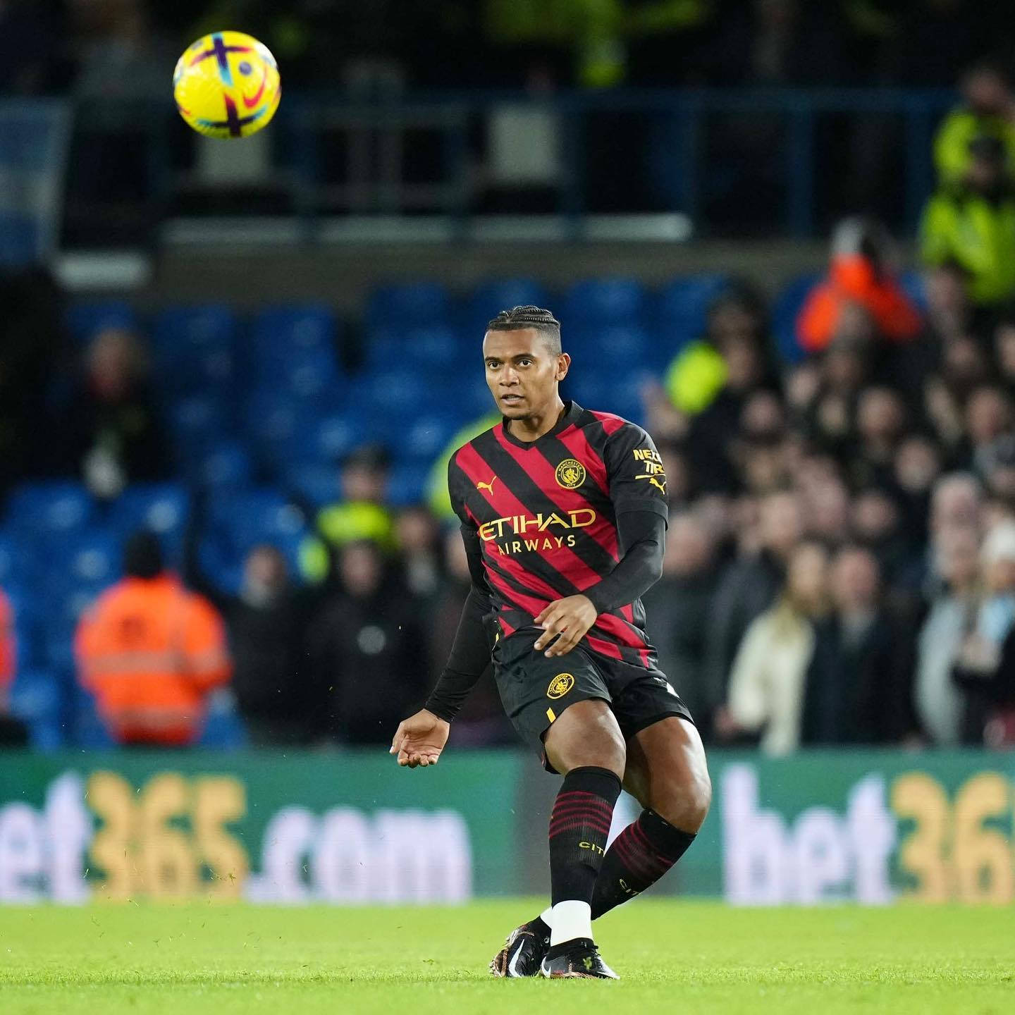 Manuel Akanji, red and black striped jersey, colorful ball, HD Desktop Wallpaper