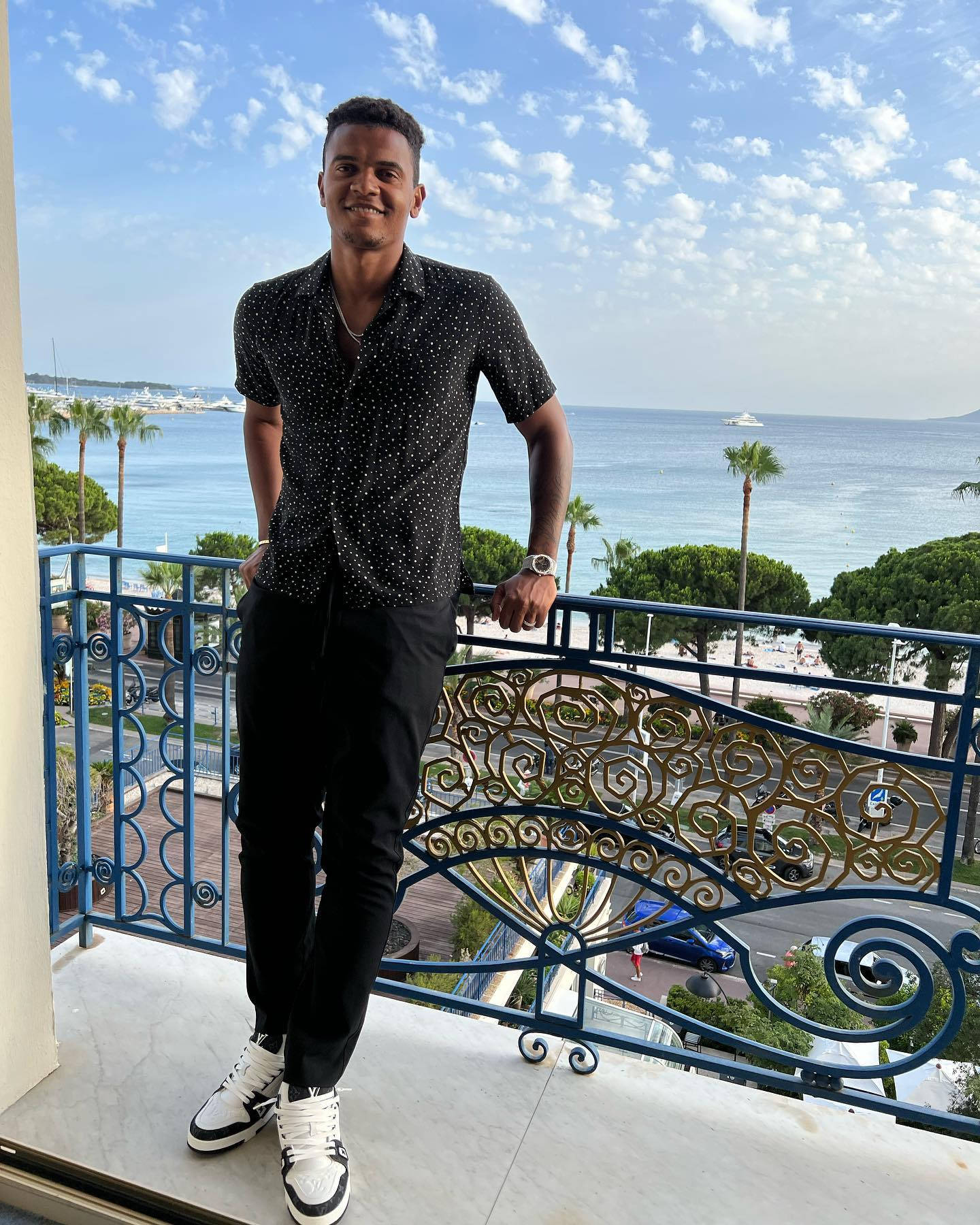 Manuel Akanji, black patterned shirt, balcony with ornate railings, HD Phone Wallpaper