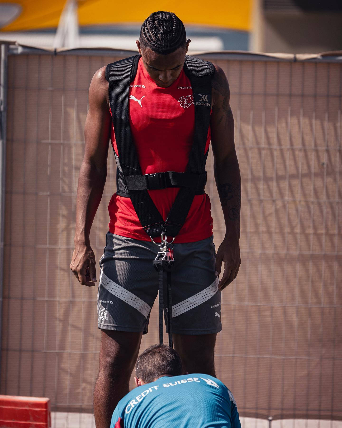 Manuel Akanji, black straps, red training gear, HD Phone Wallpaper