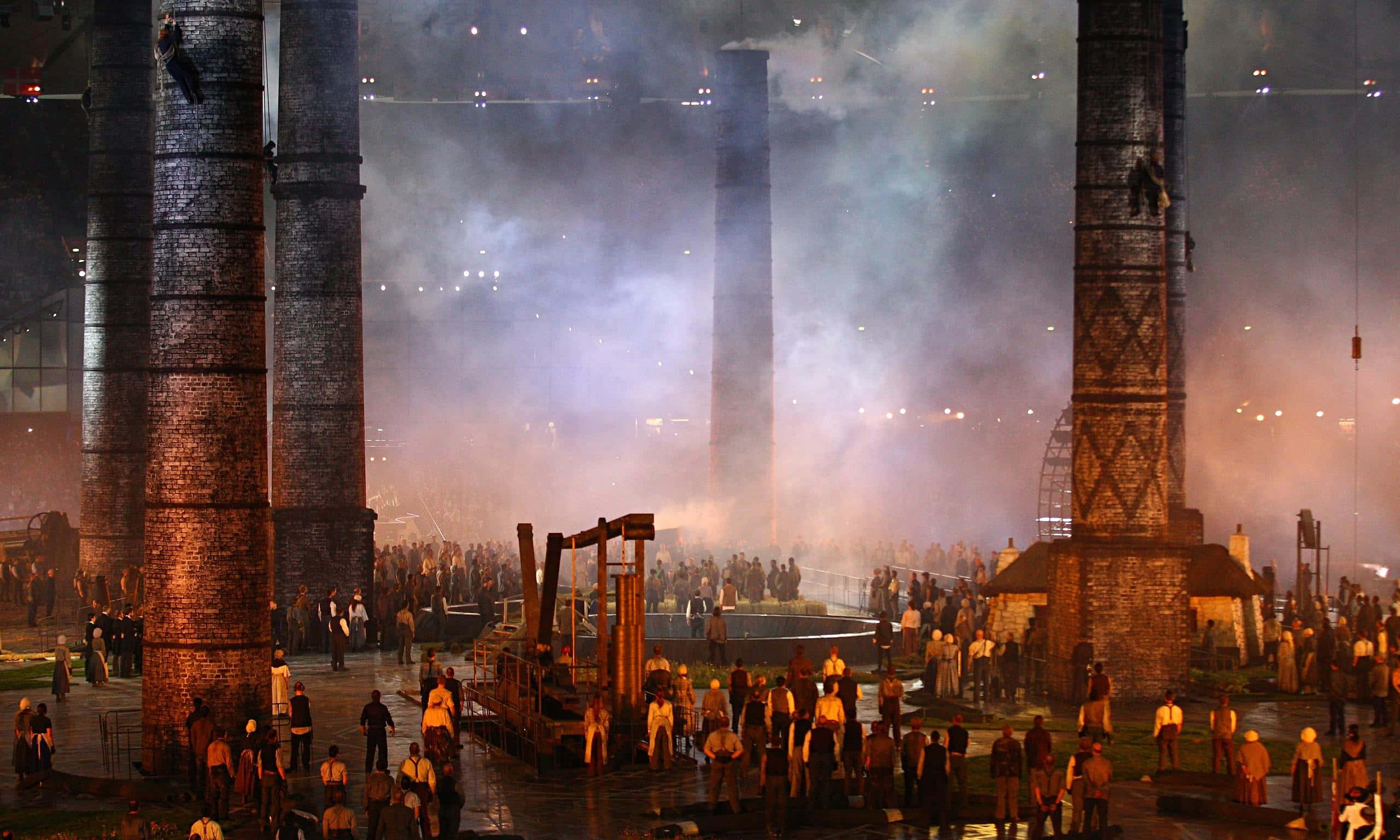 towering brick smokestacks, dramatic stage lighting, industrial workers, 2K Desktop Wallpaper