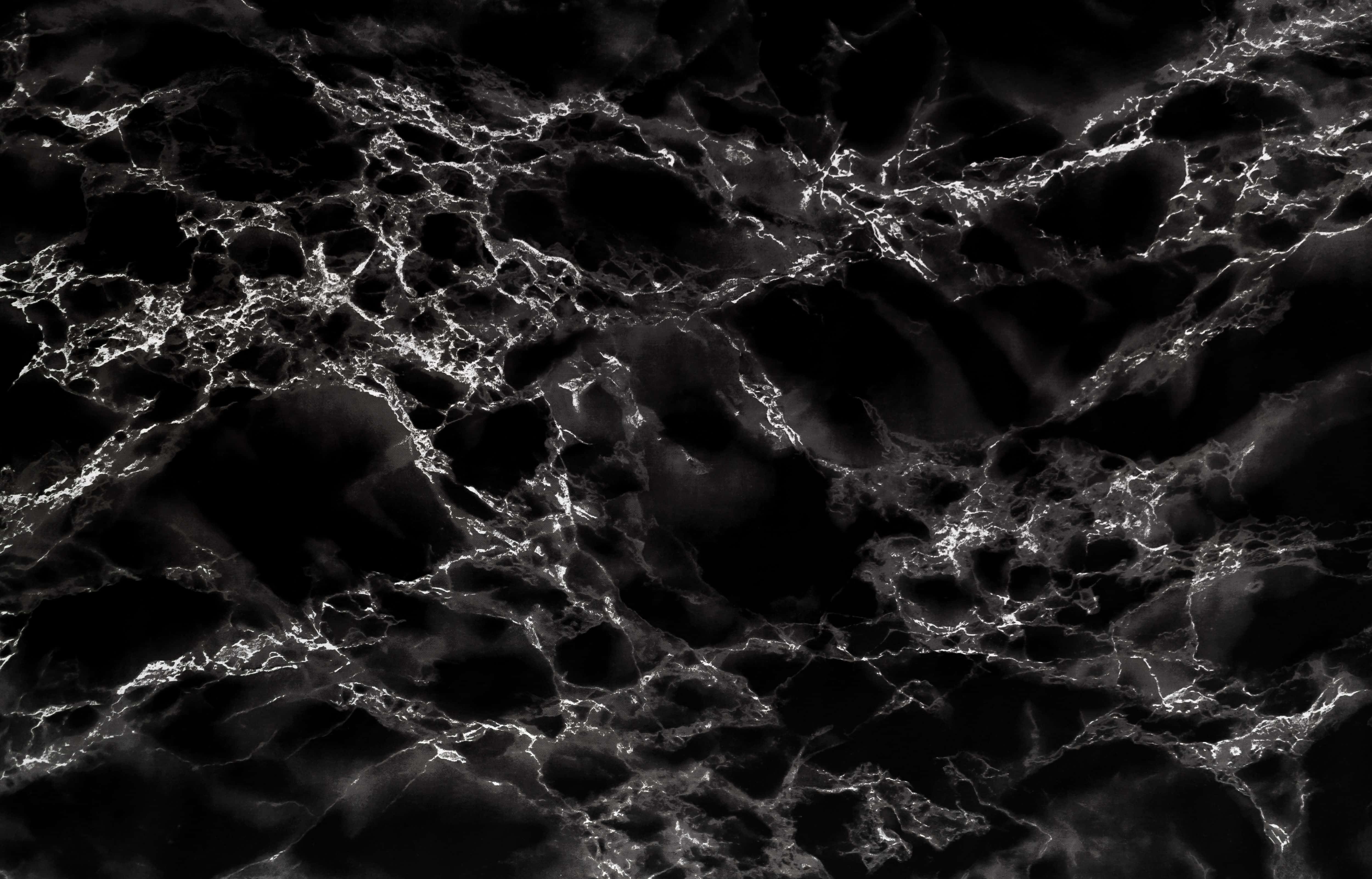 black and white wavy marble, glowing white veins, luxurious texture, 4K Desktop Wallpaper