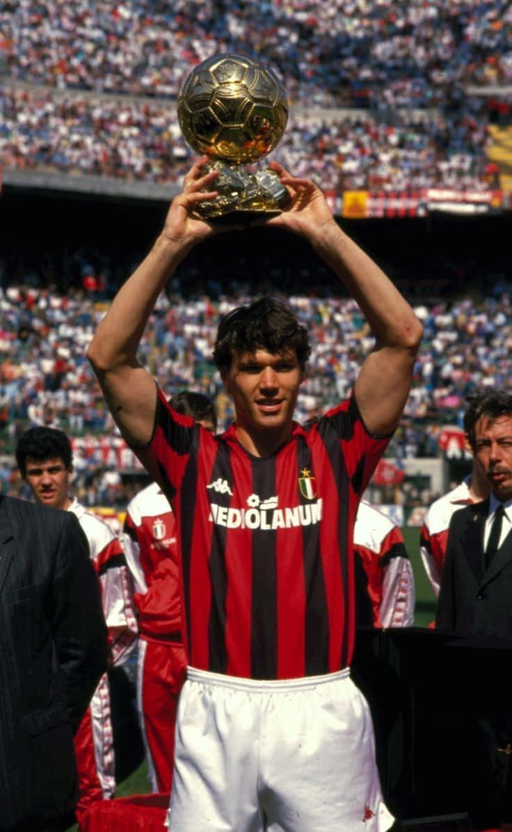 Marco Van Basten, red and black striped jersey, golden ball trophy, SD Phone Wallpaper