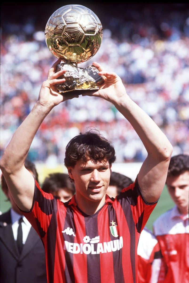 Marco Van Basten, red and black striped jersey, gleaming golden ball trophy, SD Phone Wallpaper