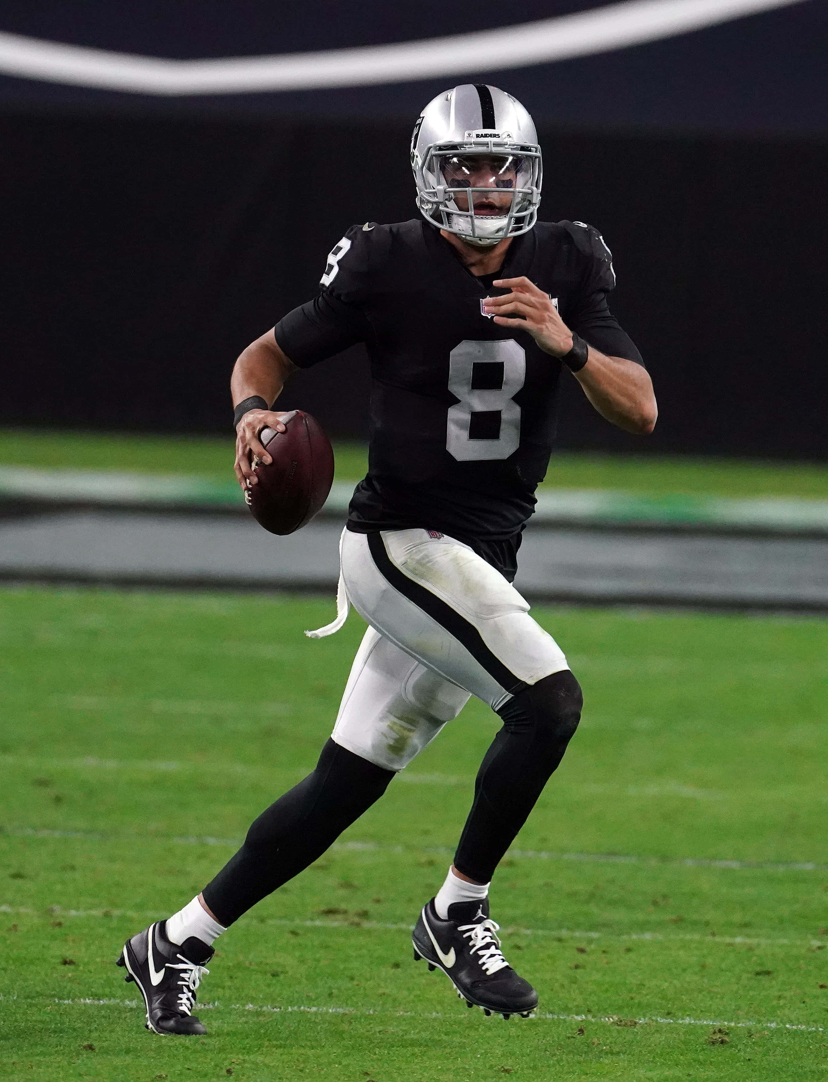 Marcus Mariota, black and silver uniform, green field, 2K Phone Wallpaper