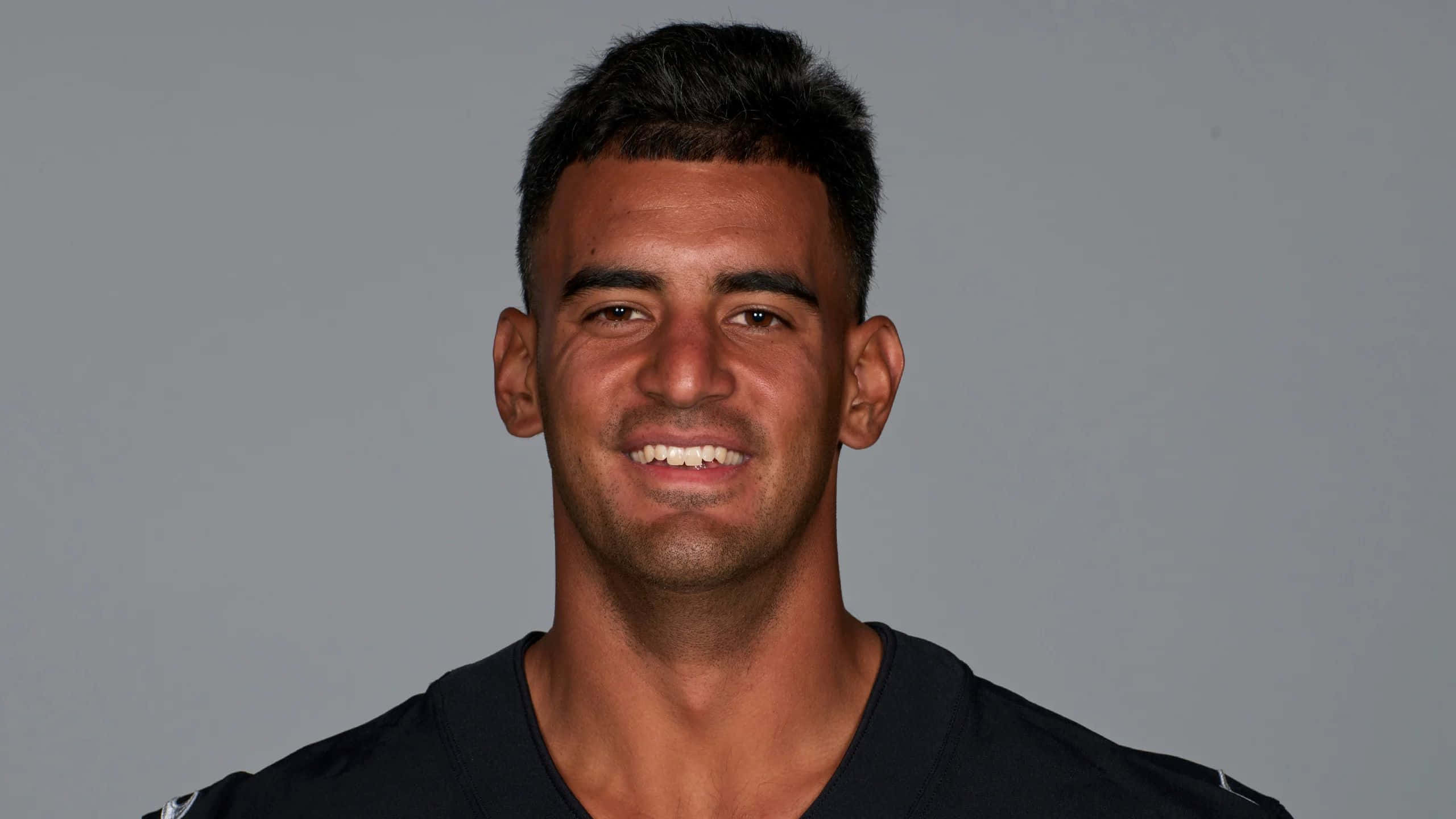 Marcus Mariota, black sports jersey, short dark hair, 2K Desktop Wallpaper