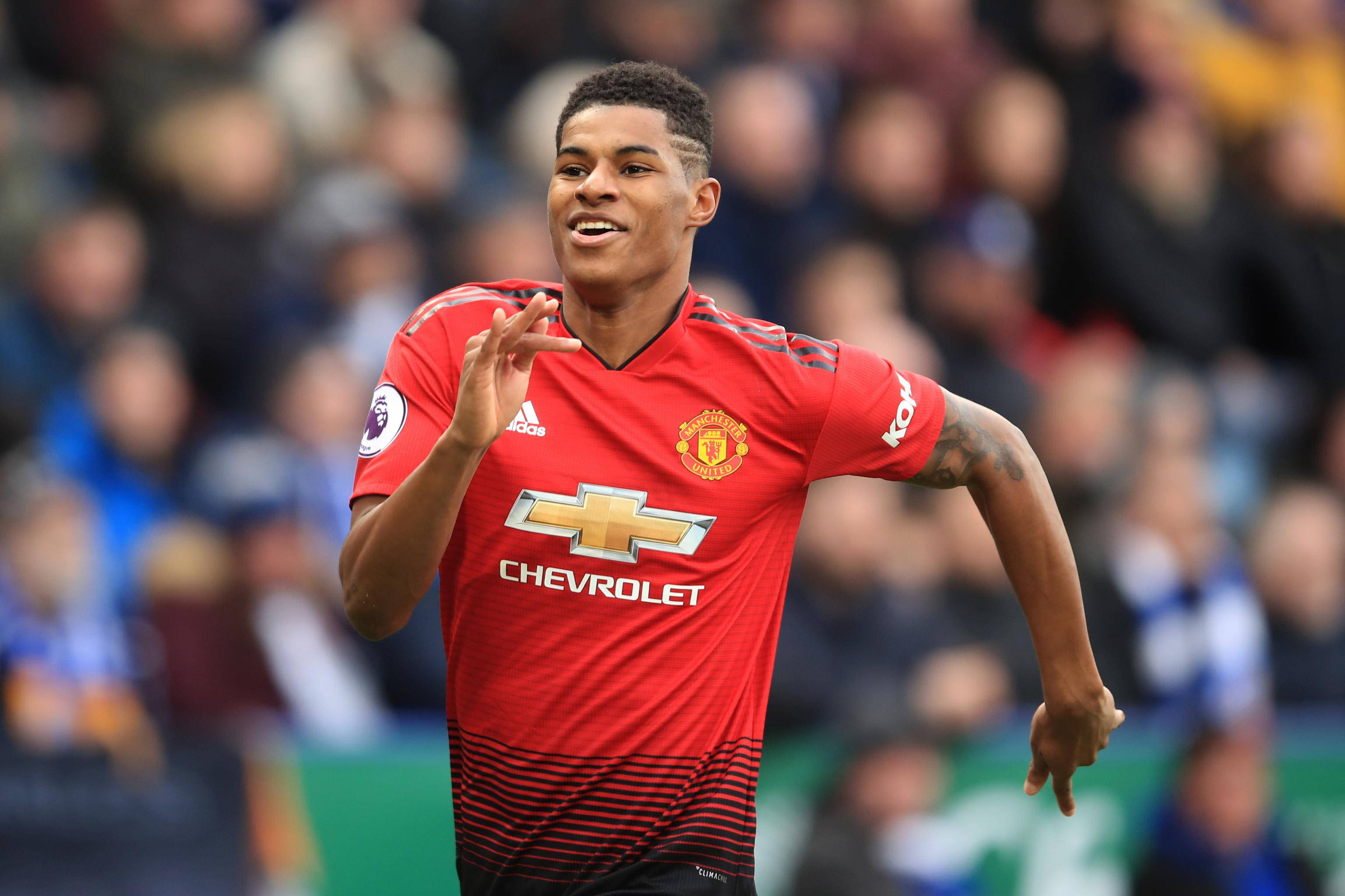 Marcus Rashford, red Manchester United jersey, joyful expression, 2K Desktop Wallpaper