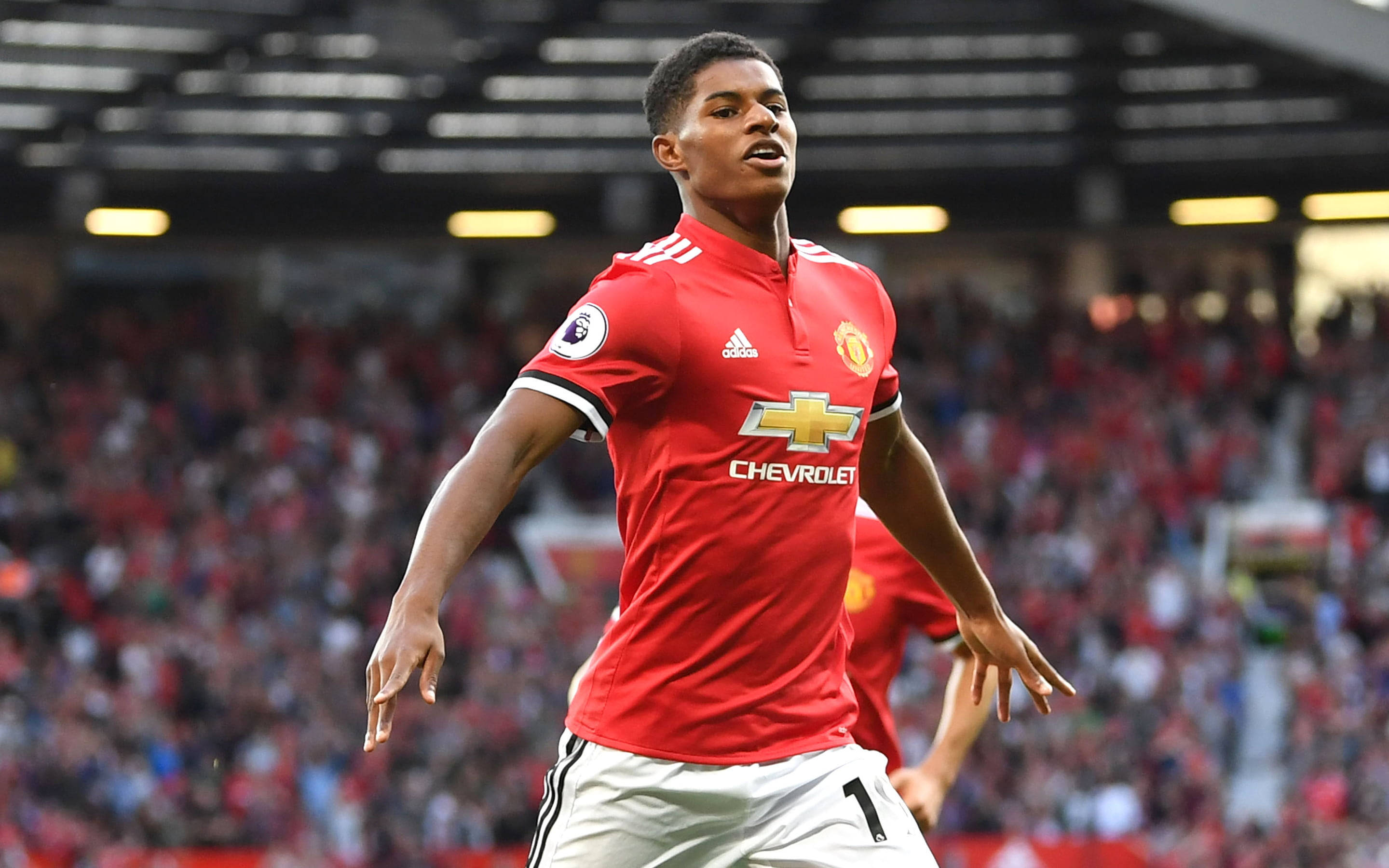 Marcus Rashford, red Manchester United jersey, packed stadium, 2K Desktop Wallpaper