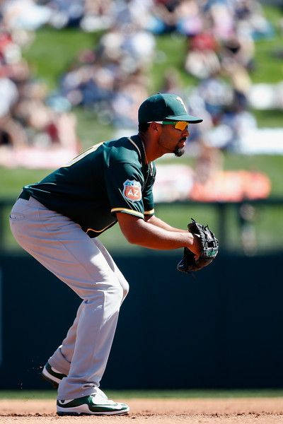 Marcus Semien, green and gold uniform, sunlit field, SD Phone Wallpaper