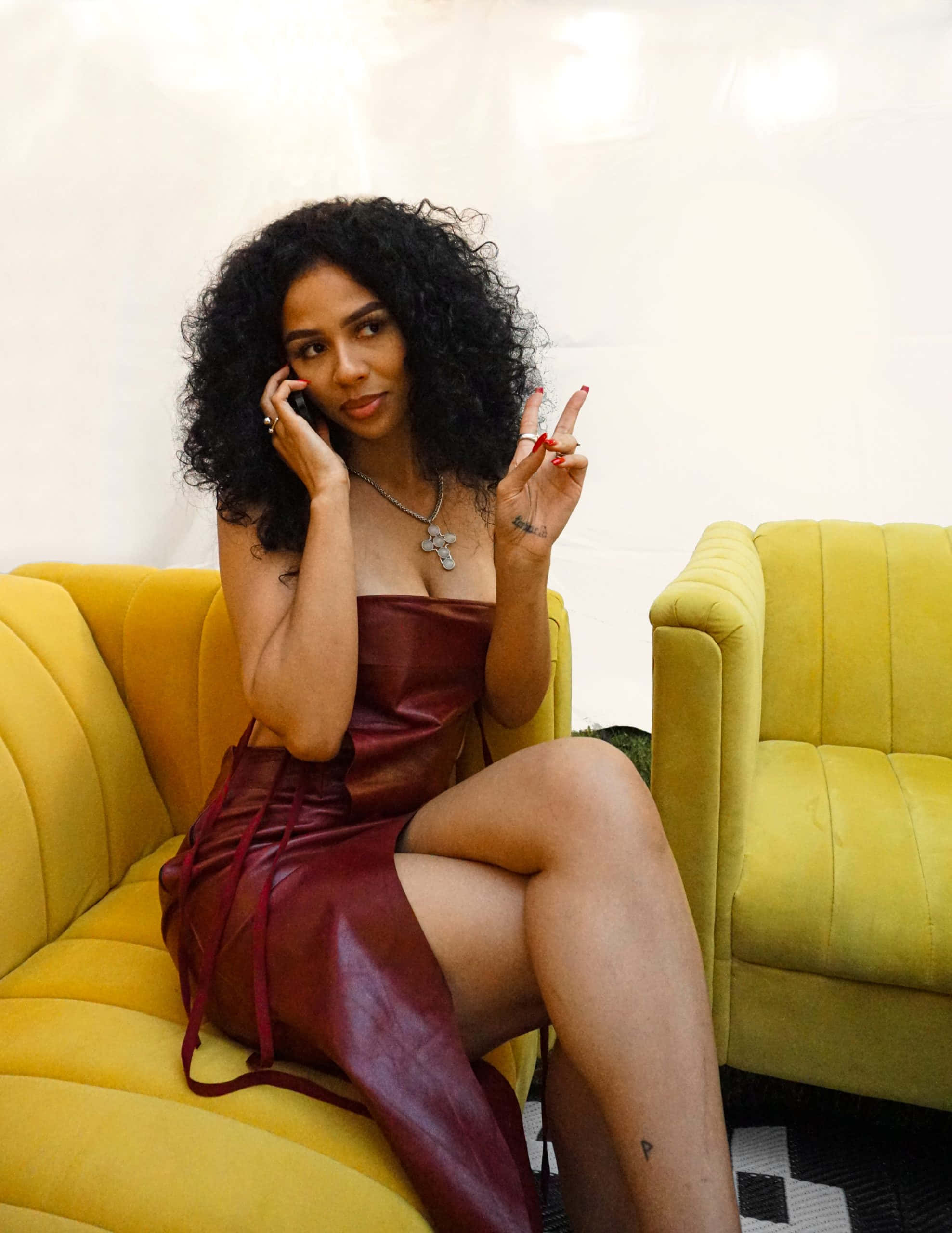 Mariah The Scientist, yellow couch, red leather dress, 2K Phone Wallpaper
