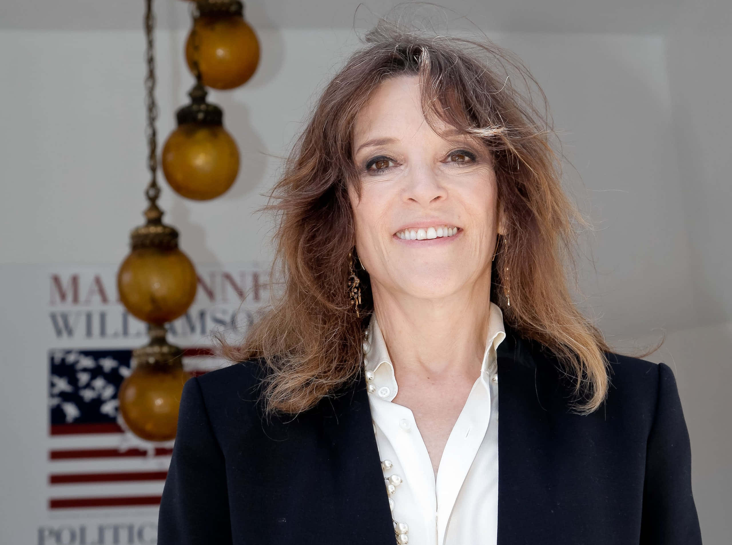 Marianne Williamson, black blazer, white pearl-buttoned shirt, 2K Desktop Wallpaper