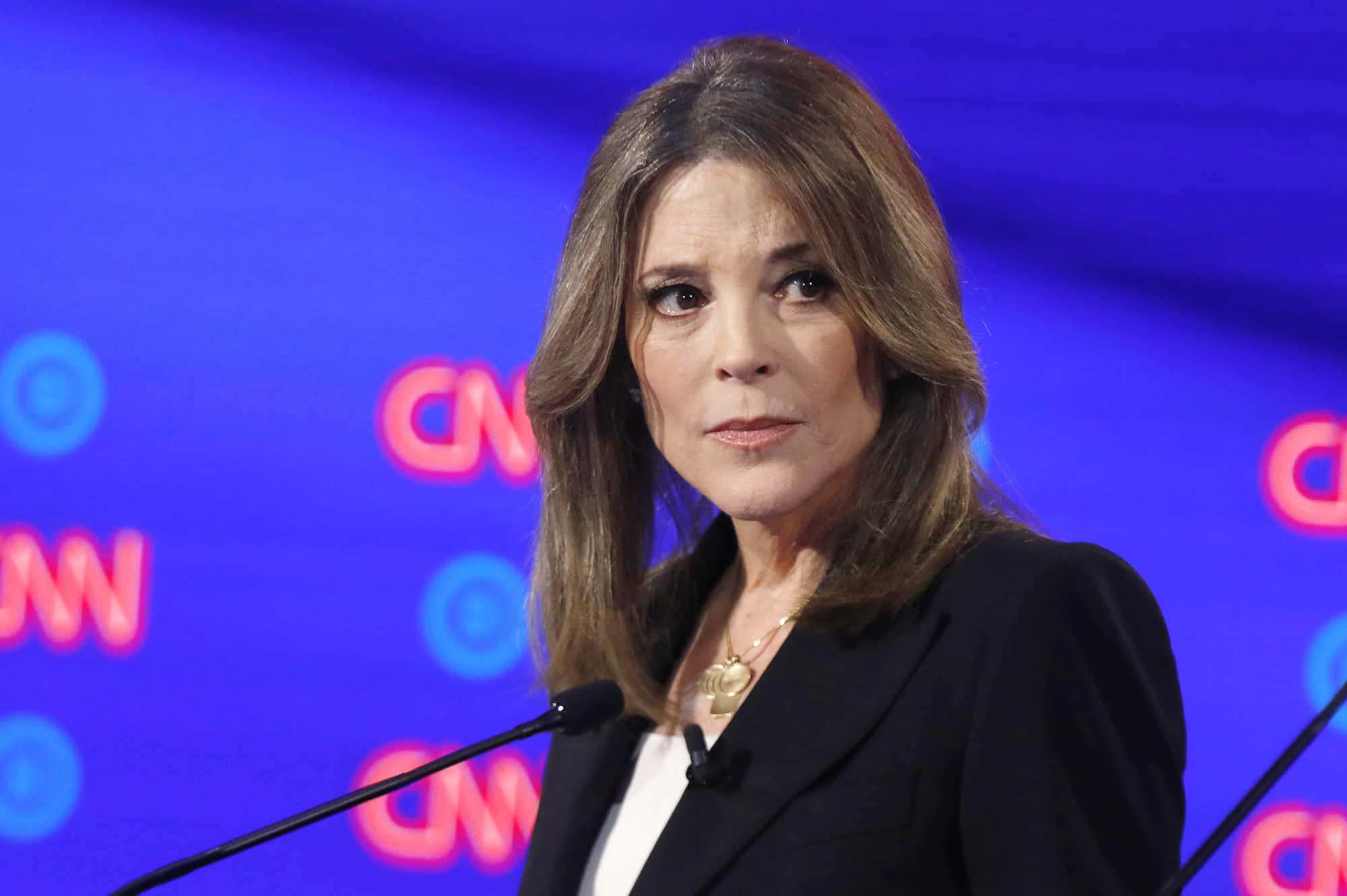 Marianne Williamson, black blazer, podium, Full HD Desktop Wallpaper
