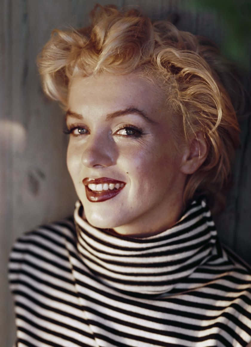 Marilyn Monroe, black and white striped turtleneck, wooden backdrop, SD Phone Wallpaper