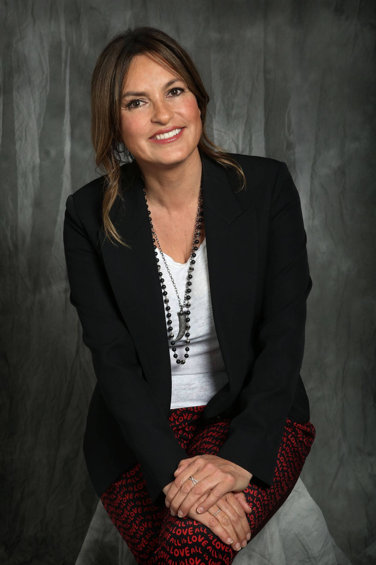 Mariska Hargitay, black blazer, red patterned pants, Full HD Phone Wallpaper