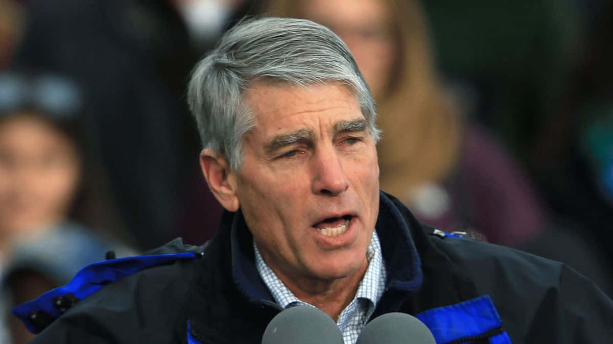 Mark Udall, blue-trimmed jacket, microphones, SD Desktop Wallpaper