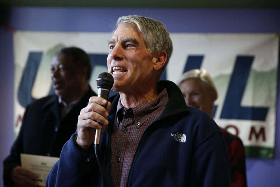 Mark Udall, blue North Face jacket, microphone, SD Desktop Wallpaper