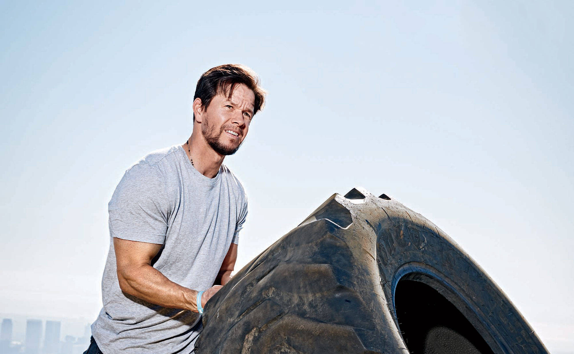 Mark Wahlberg, tire, city skyline, Full HD Desktop Wallpaper