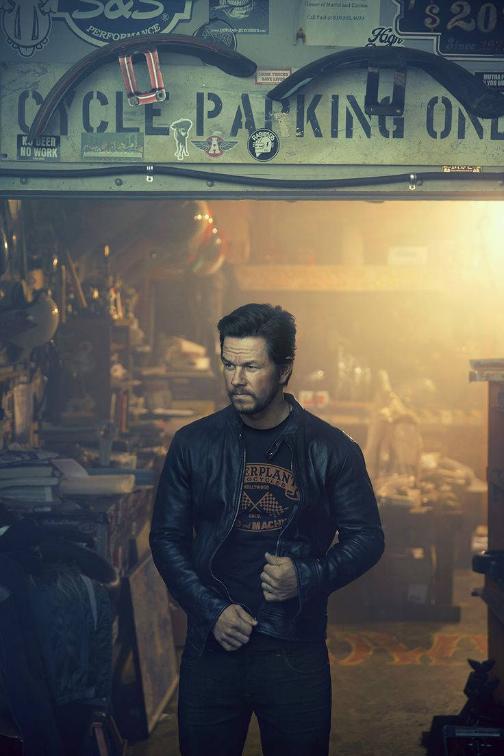 Mark Wahlberg, leather jacket, dimly lit garage, SD Phone Wallpaper
