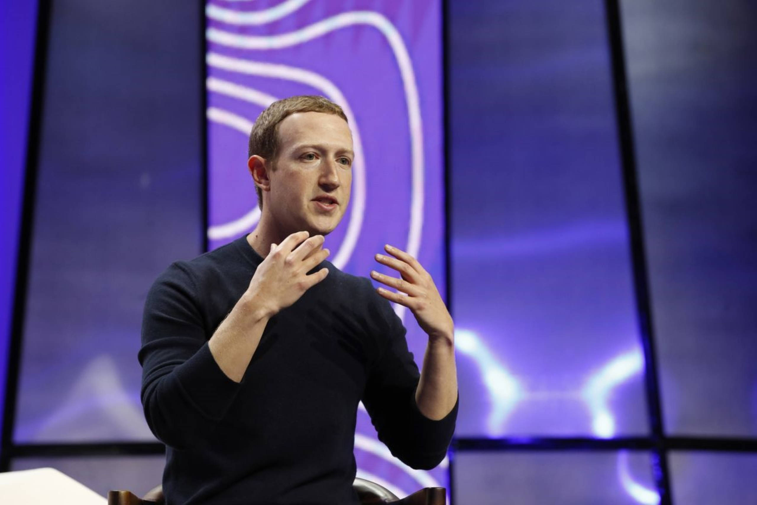 Mark Zuckerberg, dark sweater, glowing purple backdrop, 2K Desktop Wallpaper
