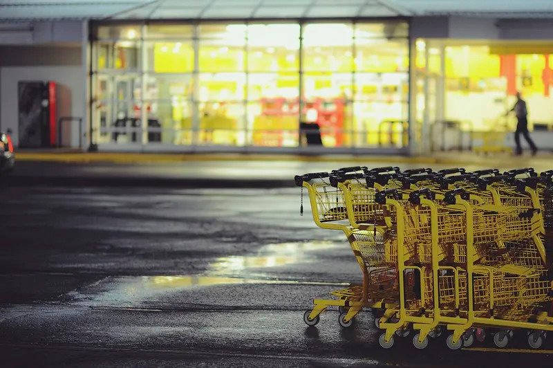 yellow shopping carts, wet parking lot, night, SD Desktop Wallpaper