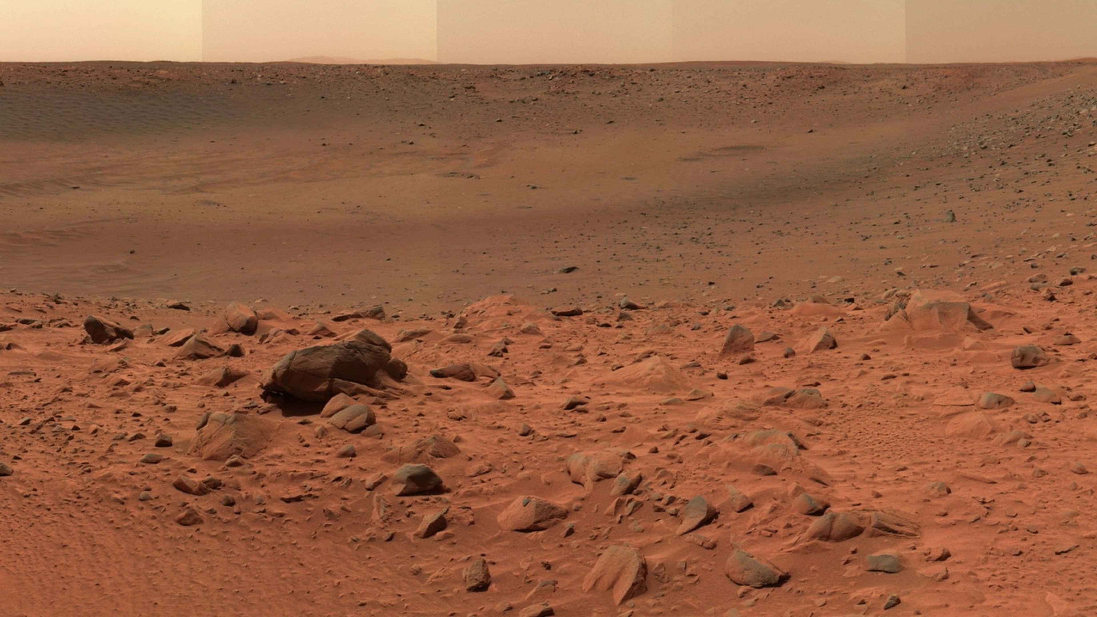 Mars, reddish soil, scattered rocks, 4K Desktop Wallpaper