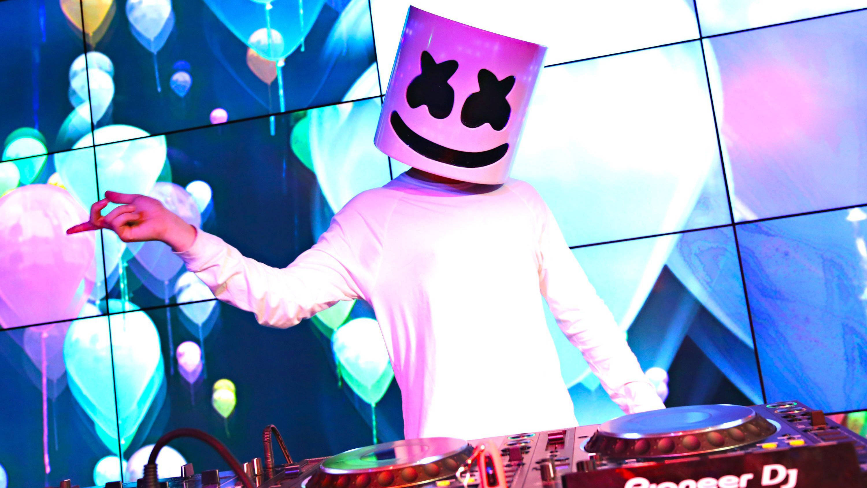Marshmello, iconic helmet, vibrant nightclub, 2K Desktop Wallpaper