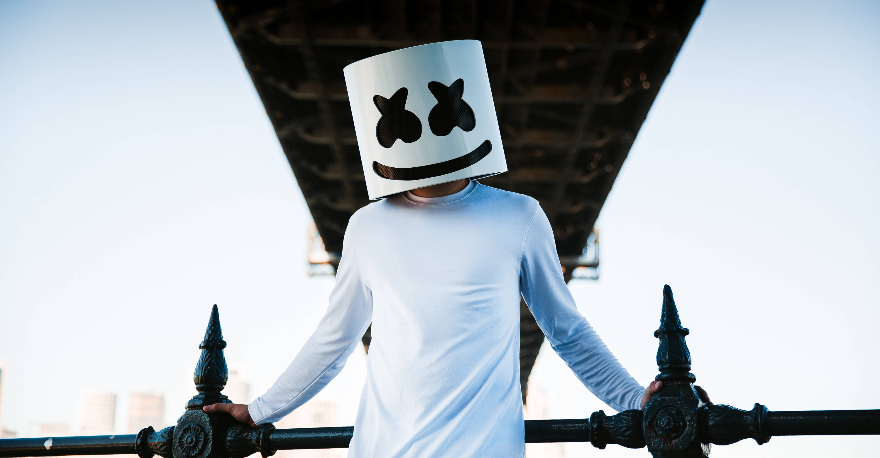 Marshmello, white marshmallow helmet, bridge railing, 2K Desktop Wallpaper
