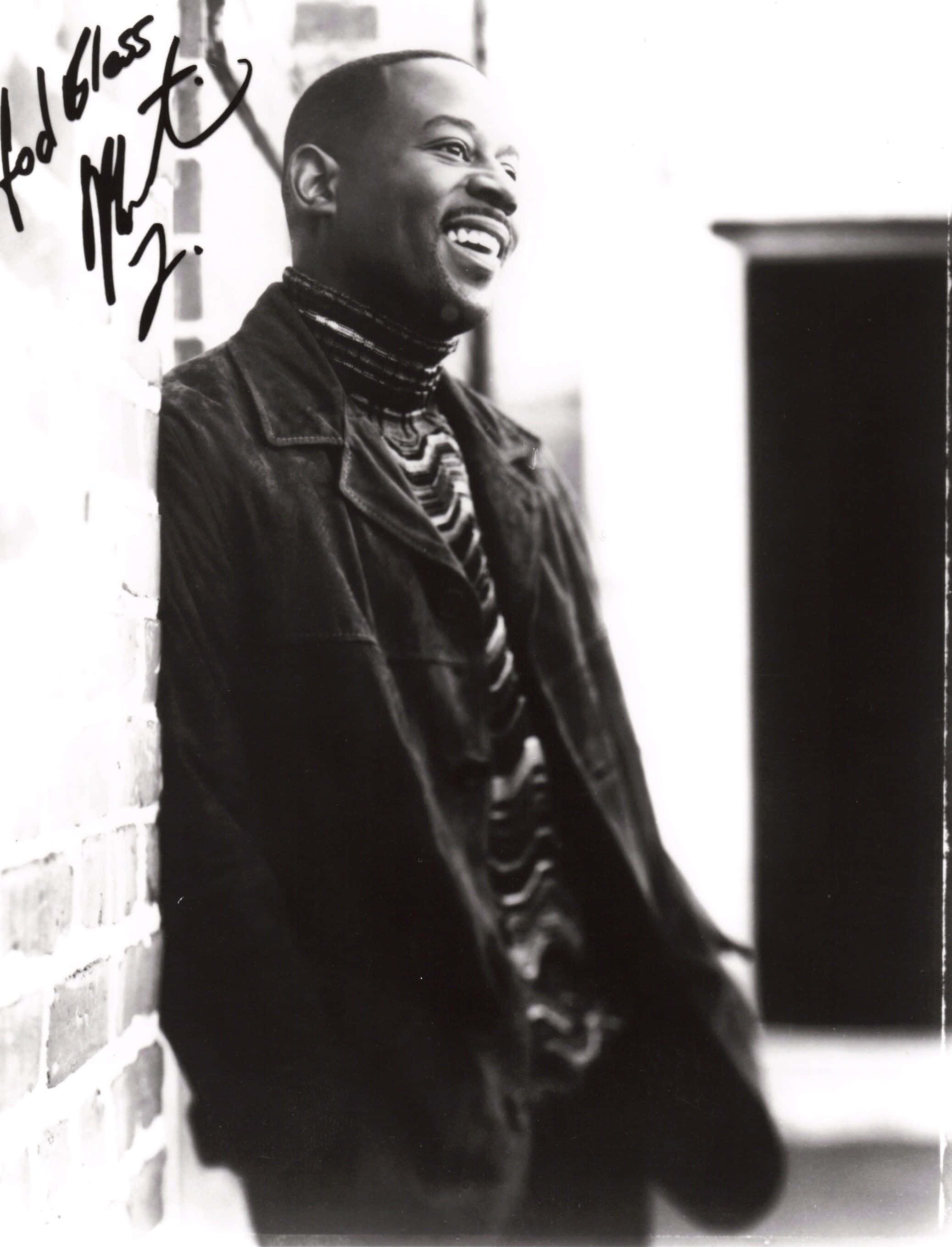 Martin Lawrence, dark jacket, brick wall, 2K Phone Wallpaper