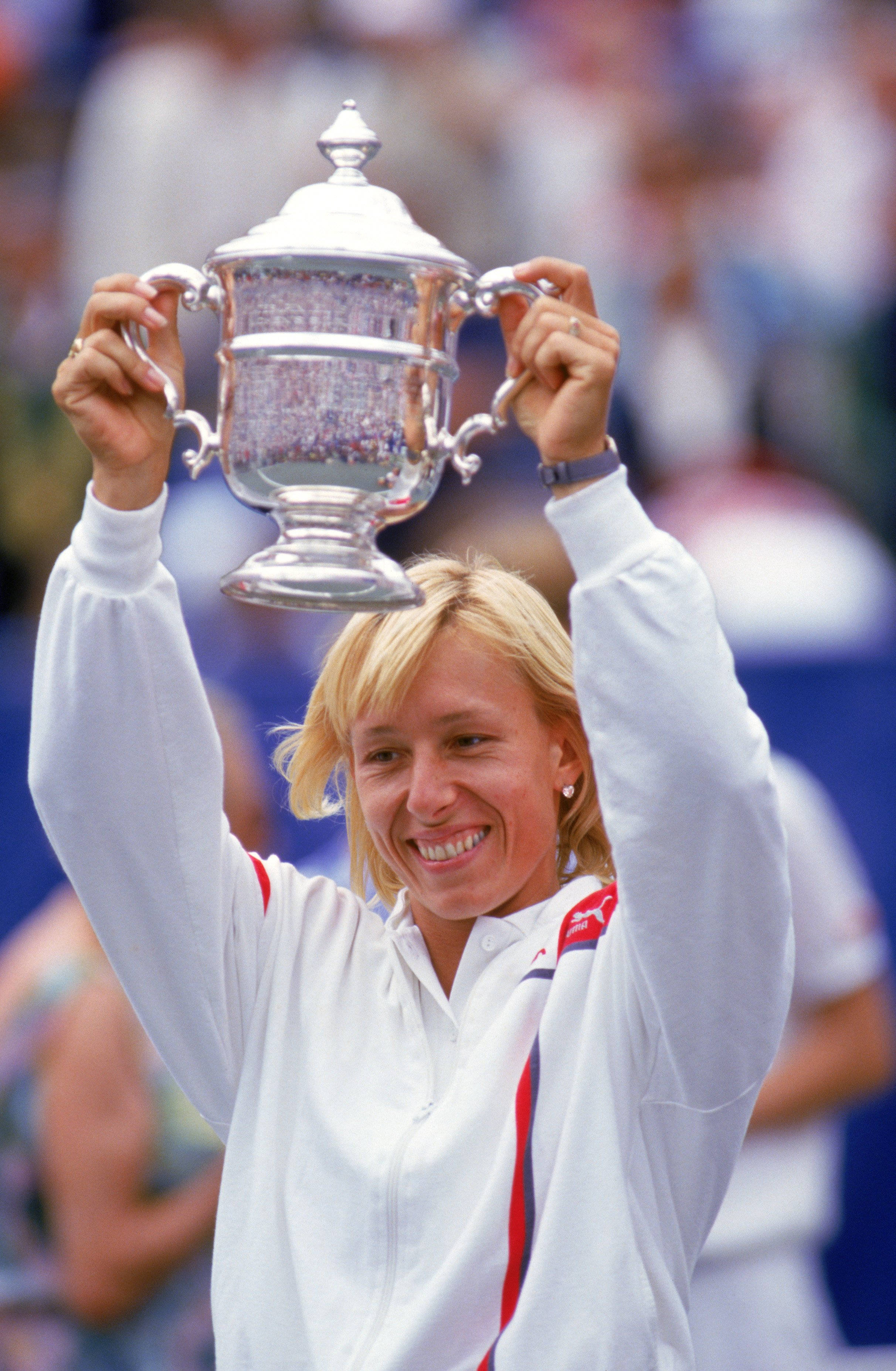 Martina Navratilova, white jacket, silver trophy, 2K Phone Wallpaper