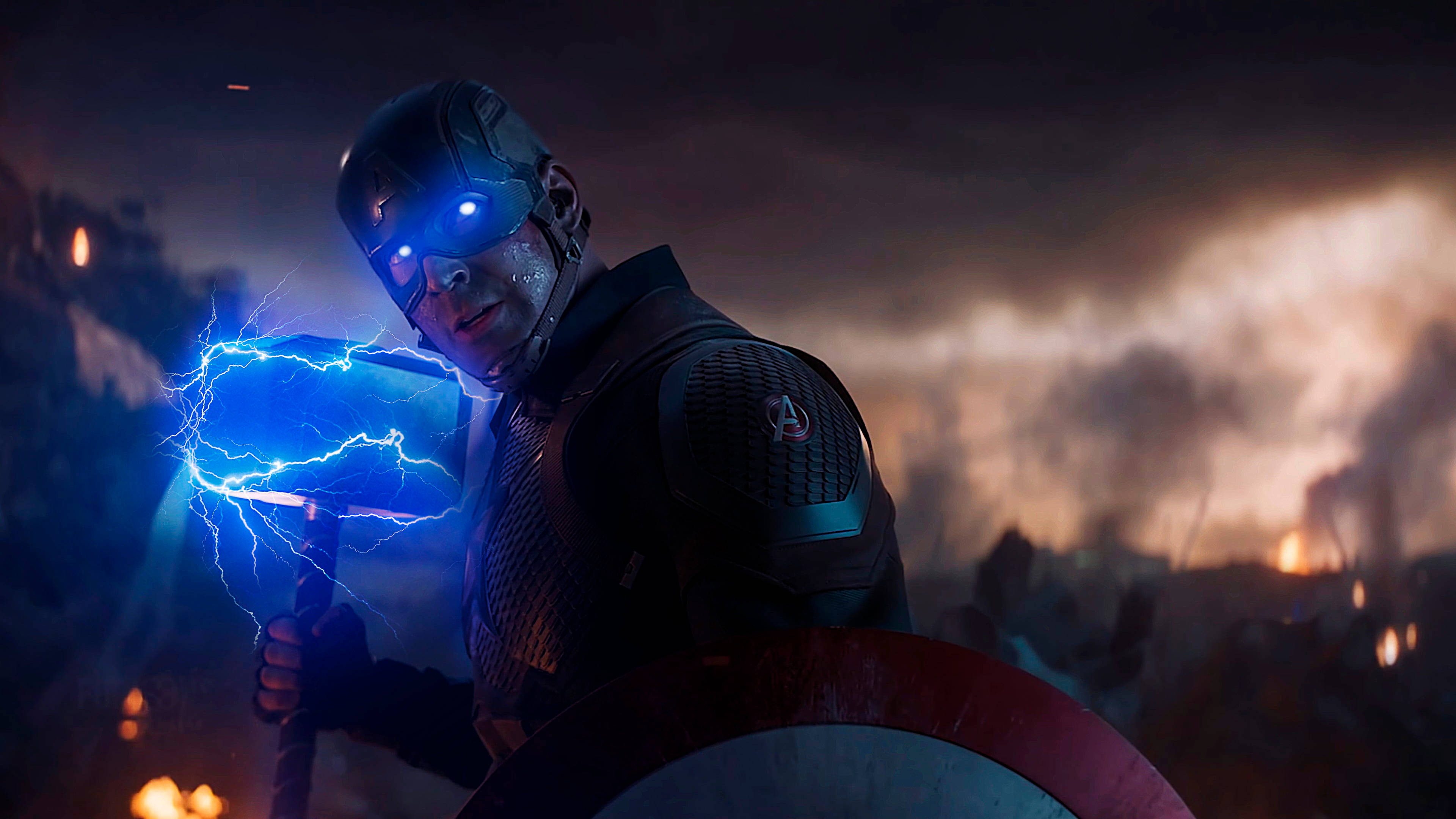 Marvel Captain America, glowing blue lightning-infused hammer, fiery battlefield backdrop, 4K Desktop Wallpaper