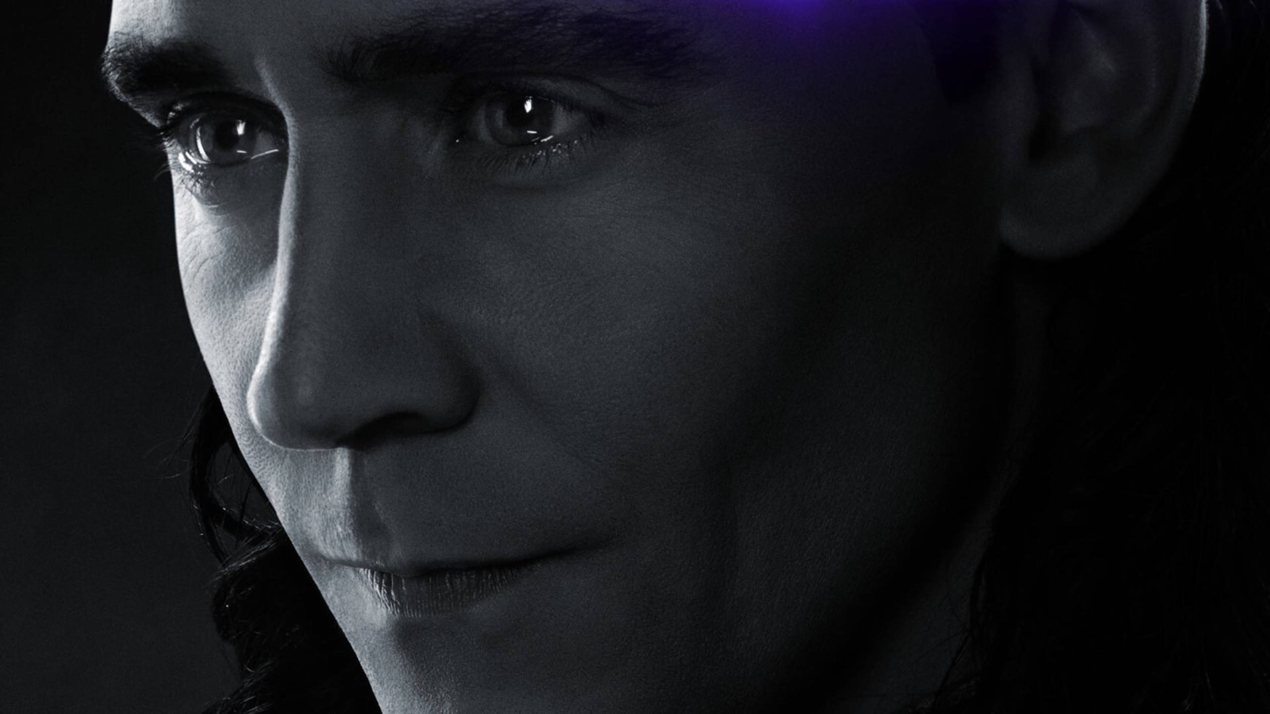Loki, purple energy glow, dark background, 2K Desktop Wallpaper
