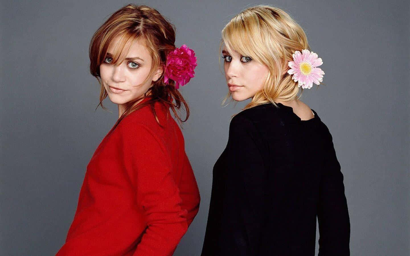Mary-Kate Olsen, red and black tops, flowers in their hair, HD Desktop Wallpaper