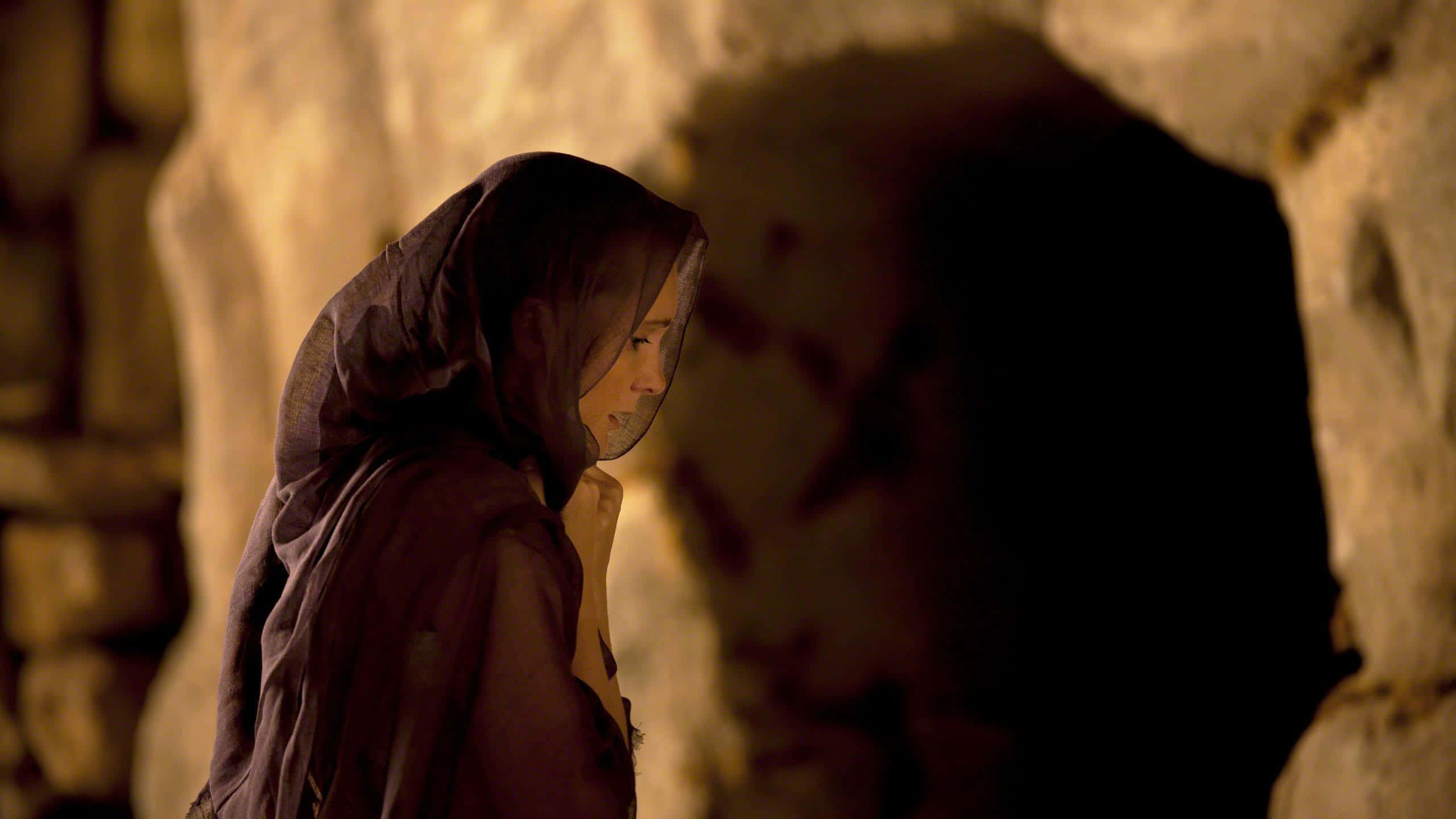 Mary Magdalene, dark veil, dimly lit stone cave, 2K Desktop Wallpaper