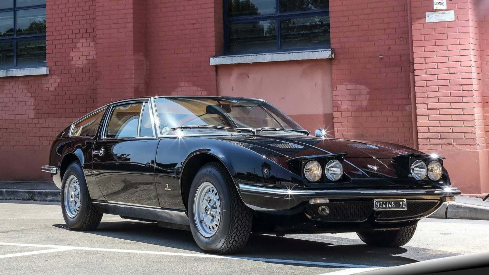 Maserati Indy, sleek black classic sports car, bright sunlight, Full HD Desktop Wallpaper