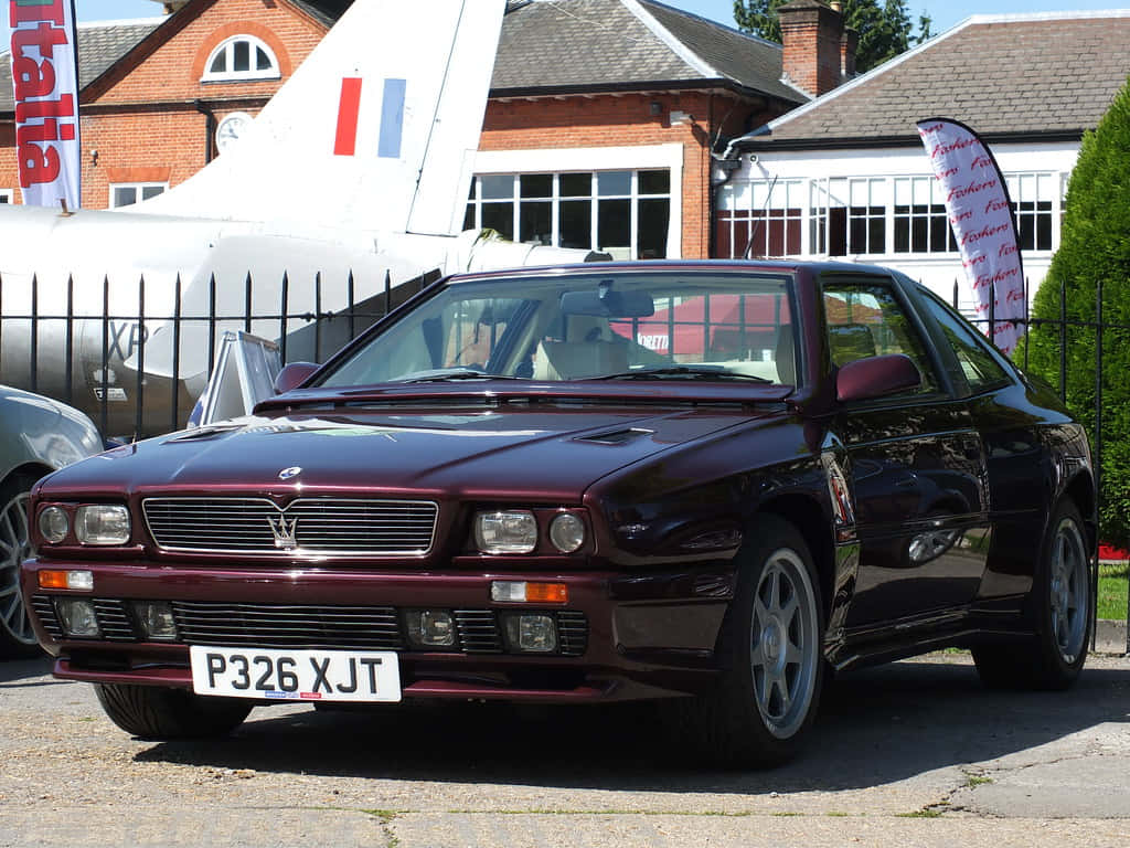 Maserati Shamal, glossy maroon, silver airplane, SD Desktop Wallpaper