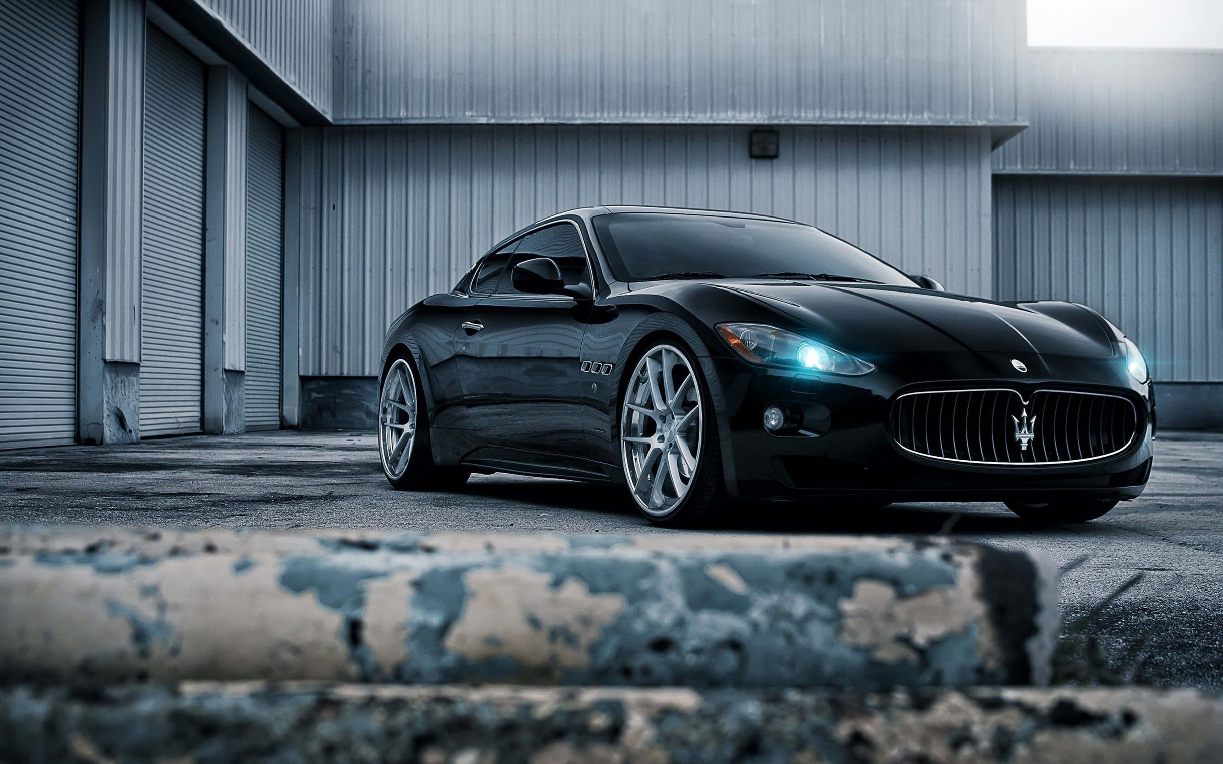Maserati, sleek black, low angle, 4K Desktop Wallpaper