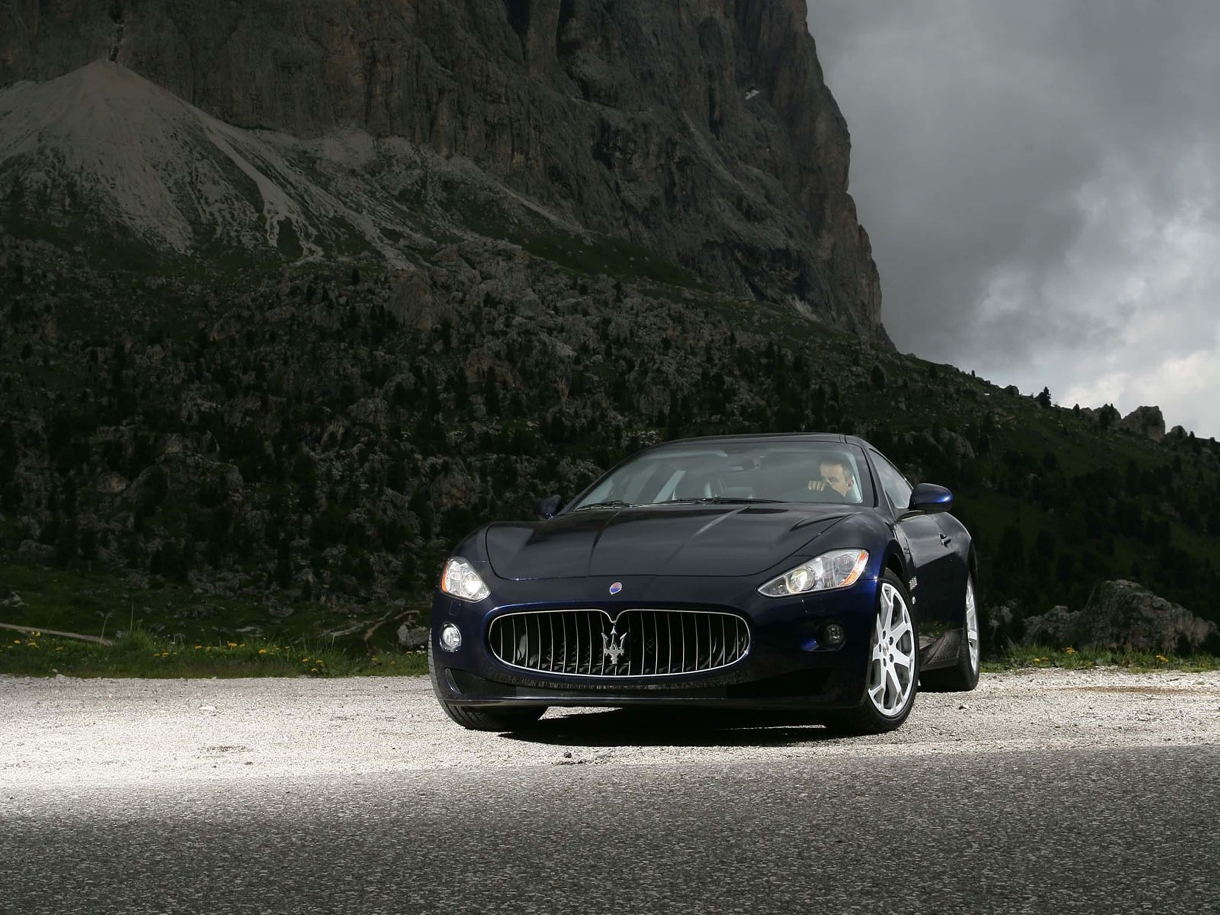 Maserati, Black Maserati, cliff, 4K Desktop Wallpaper