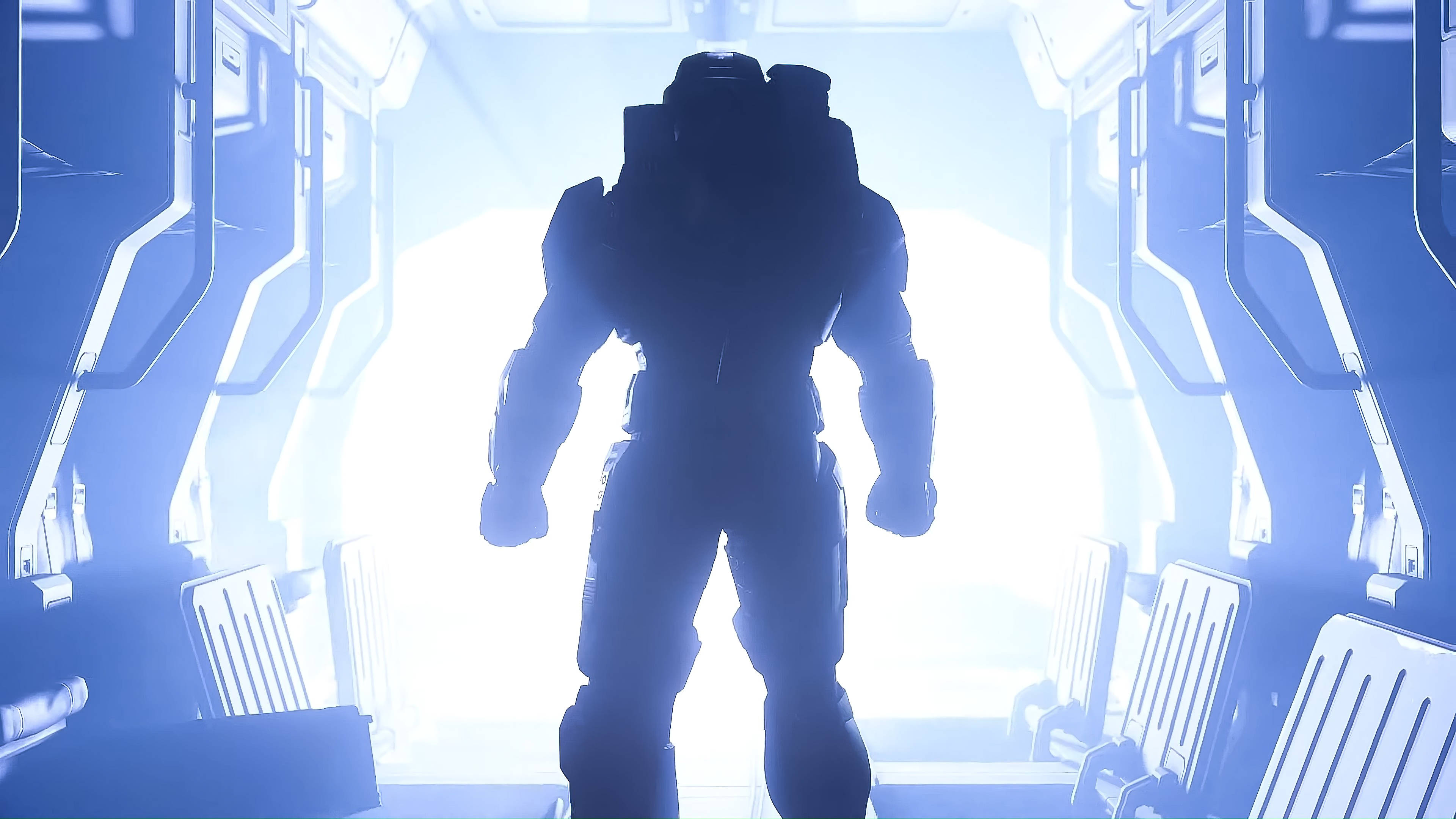 Master Chief, futuristic spaceship corridor, cool blue light, 4K Desktop Wallpaper