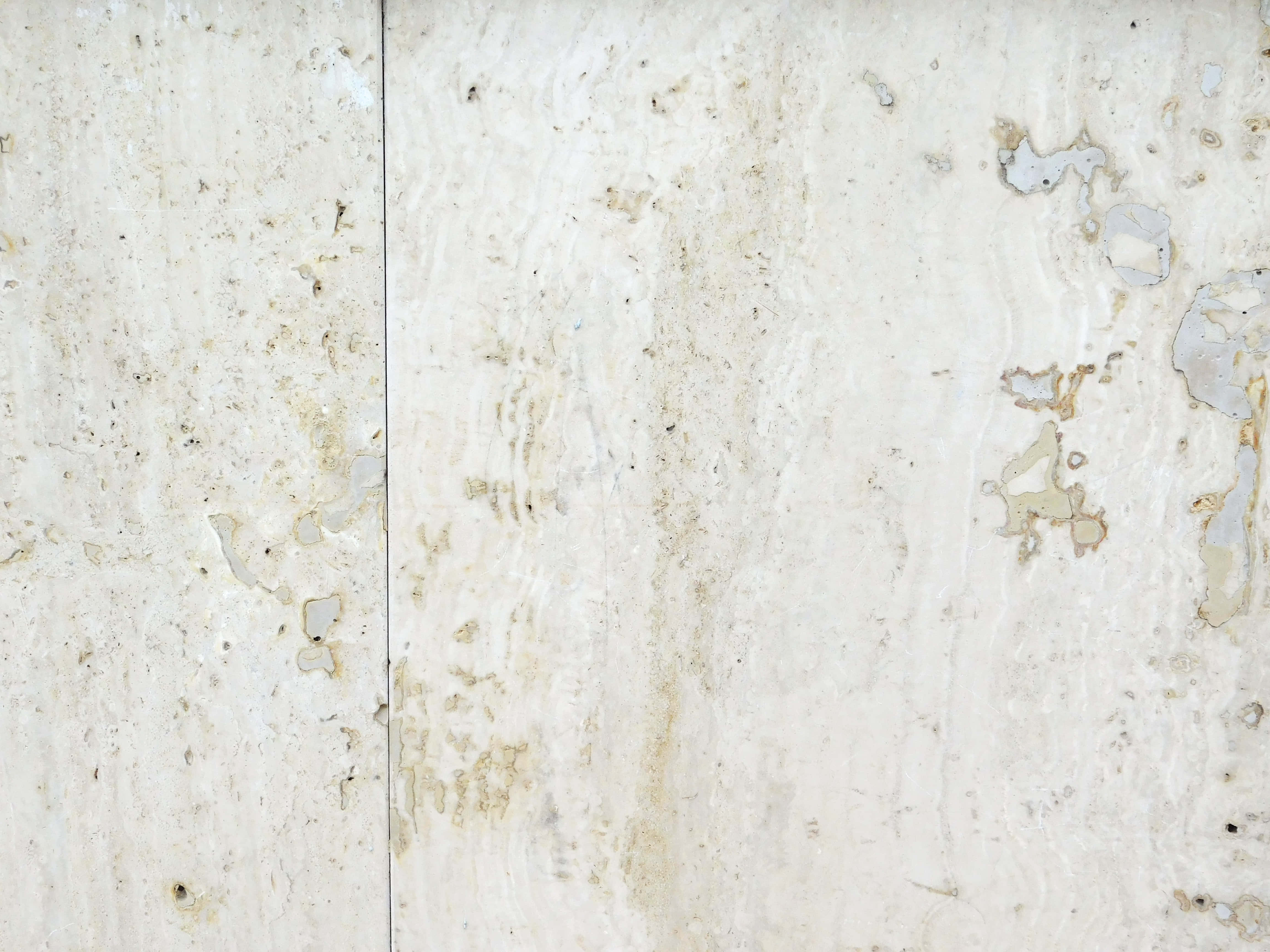 off-white marble panels, natural veining, subtle brown staining, 4K Desktop Wallpaper