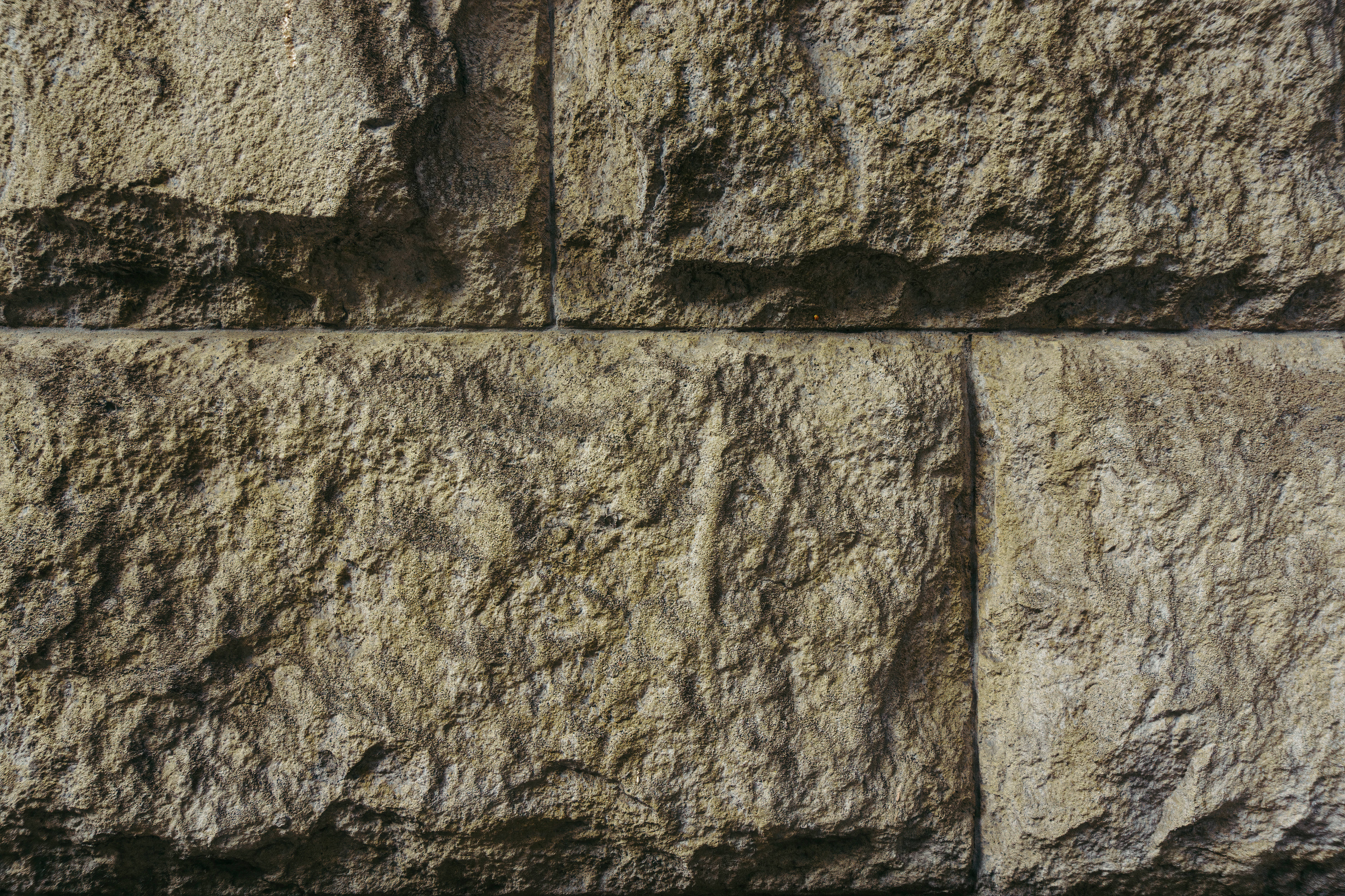 concrete wall material desktop, rough textured stone blocks, warm earthy tones, 5K Desktop Wallpaper
