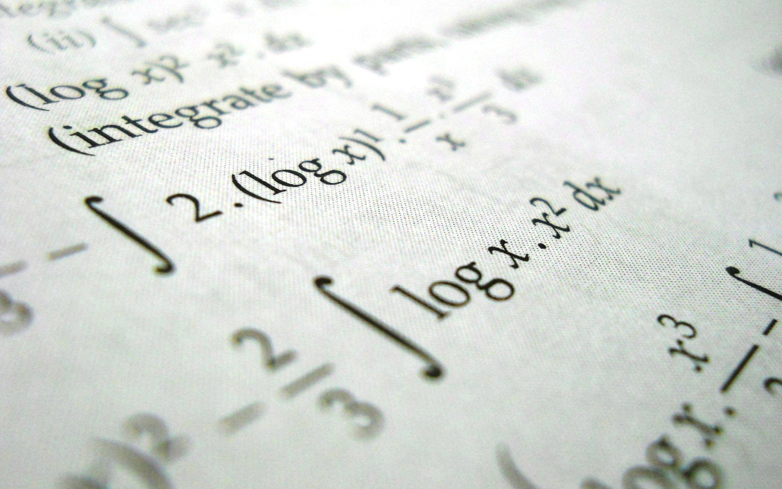 calculus equations, textured paper, shallow depth of field, 2K Desktop Wallpaper